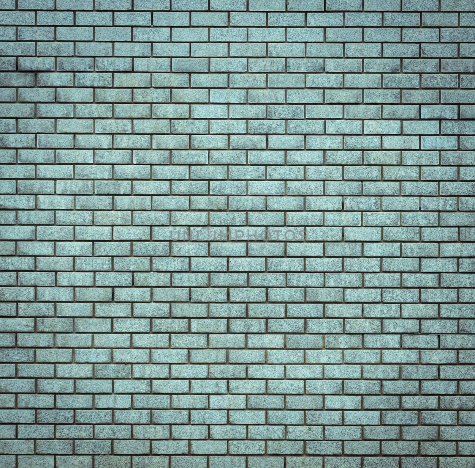 Brick stone wall texture pattern background in vintage filter effect