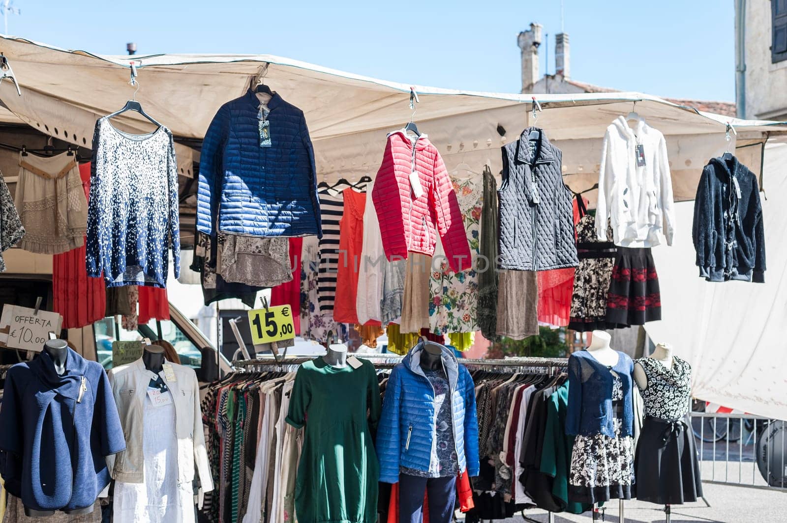 Clothes for sale at a local outdoor market. Italy