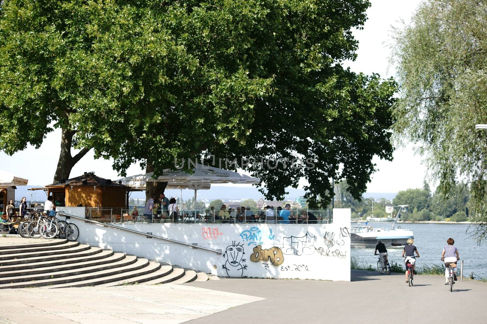 Mainz,Germany – August 22,2015: The Rheinufer Promenade on the terraces of Fort Malakoff with a beer garden and guests on August 22,2015 in Mainz.