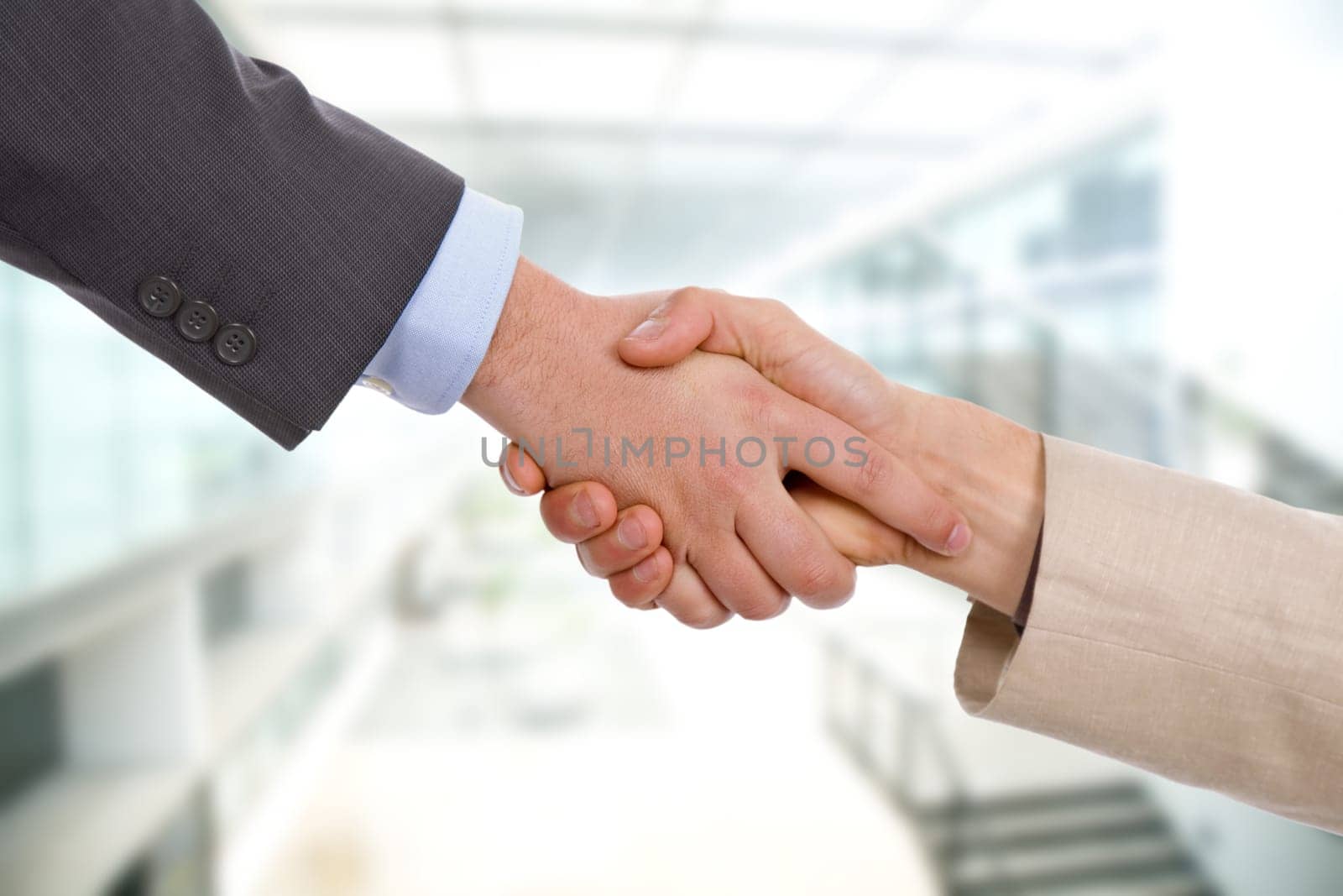 Business men hand shake at the office