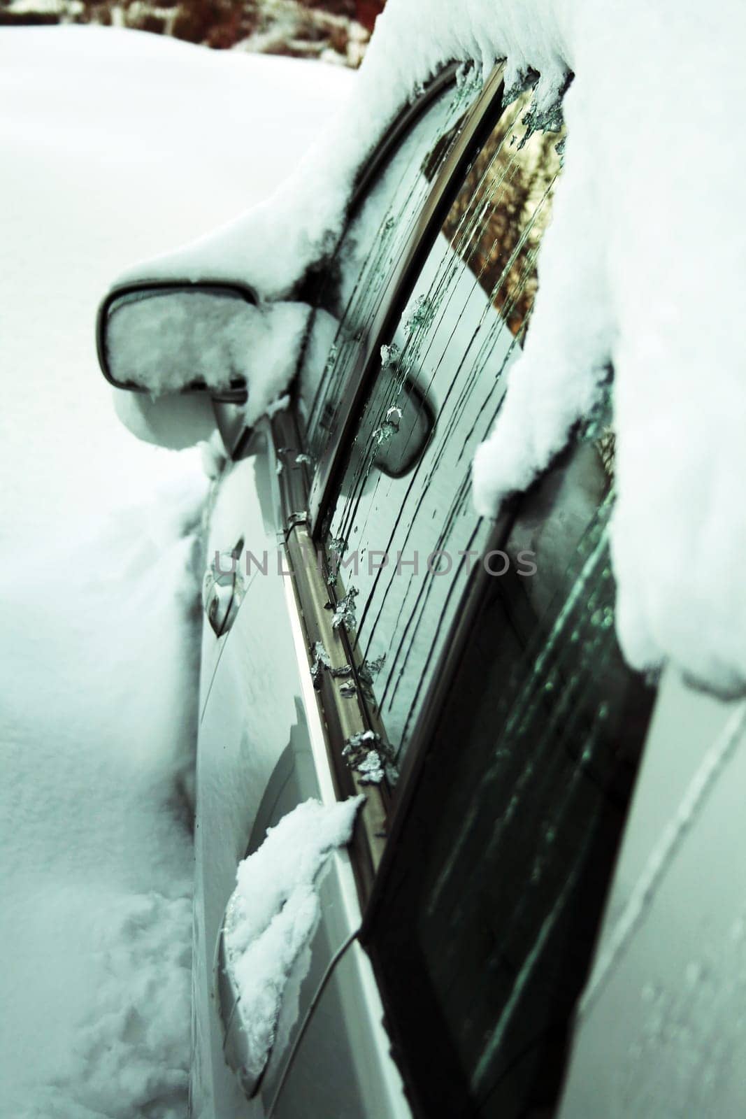 A car full of ice and snow in winter