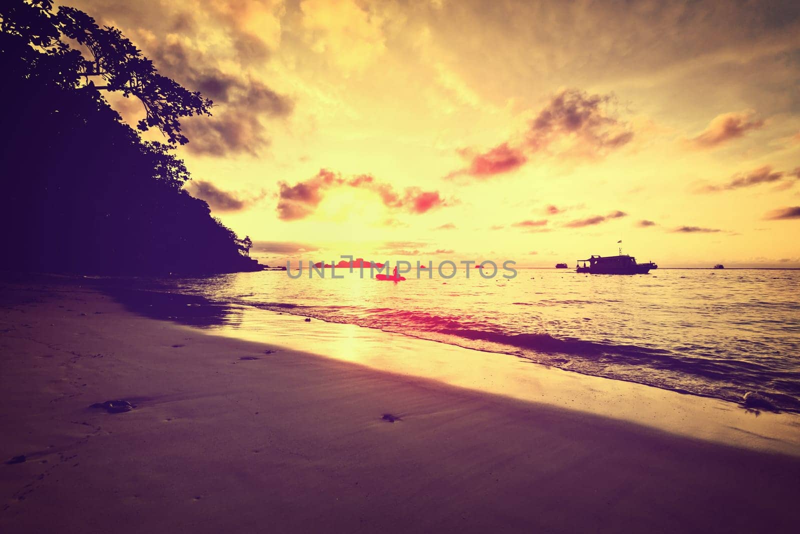 Beautiful landscapes and golden light the sky over the sea at beach of Honeymoon Bay during sunrise on Koh Miang island, Mu Ko Similan National Park, Phang Nga, Thailand, Vintage Style
