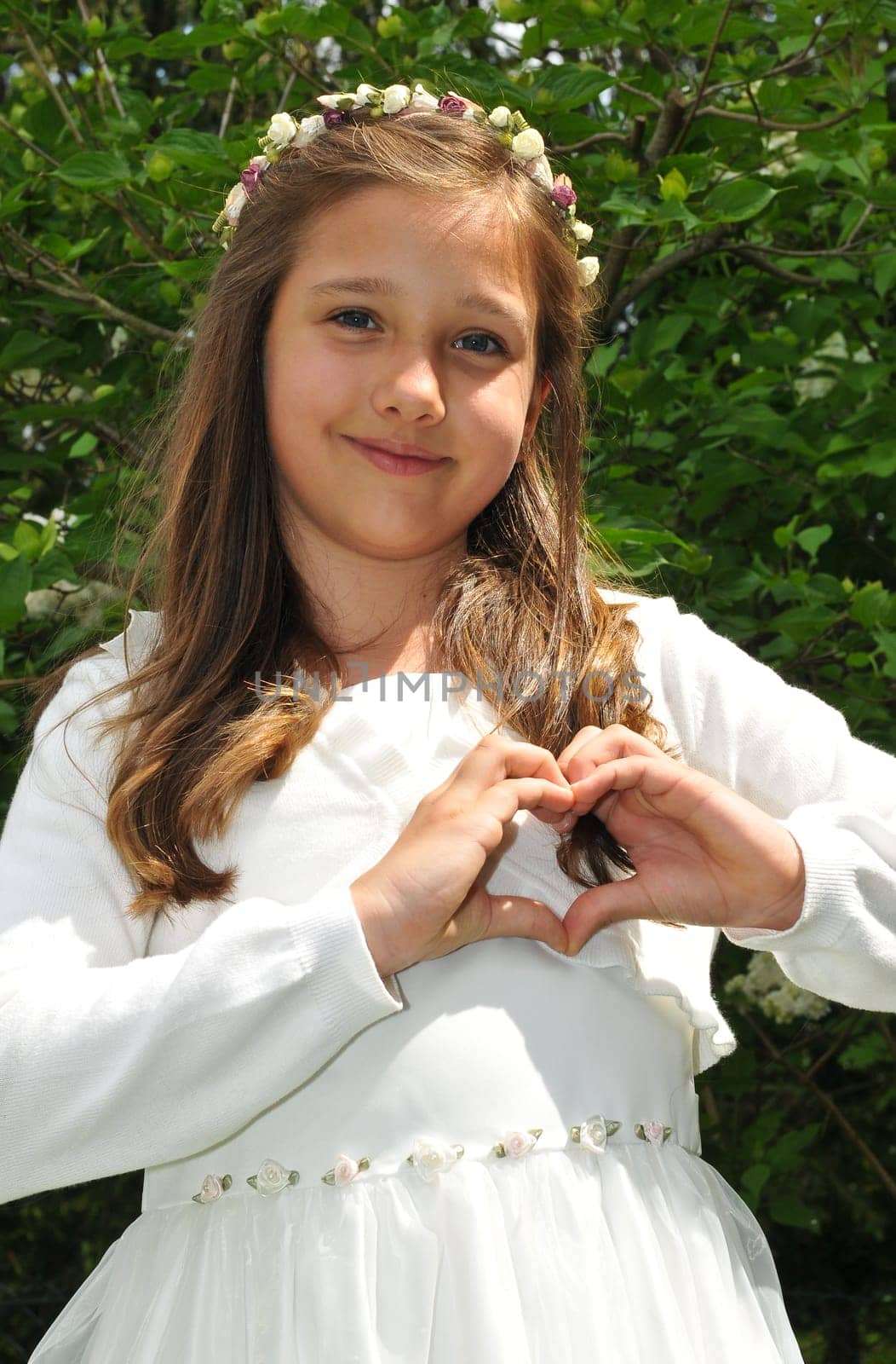 Communion child pretty girl with white dress