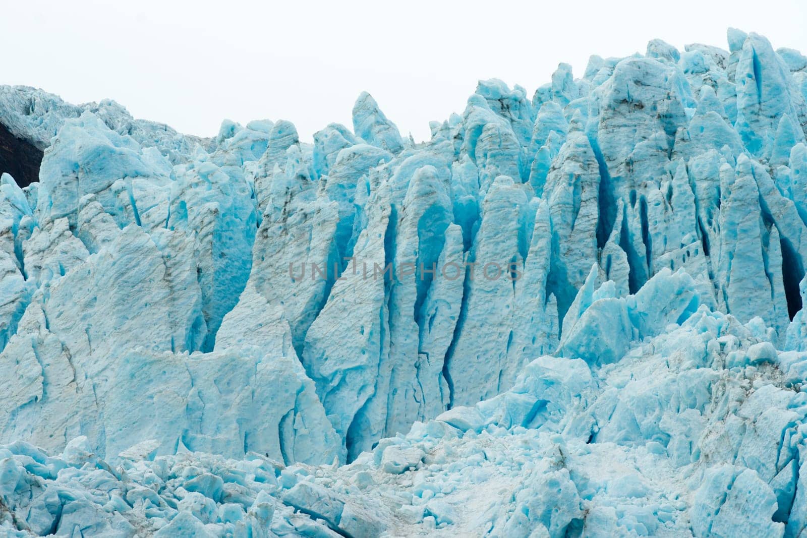 Jagged peaks form as ice calves off over time