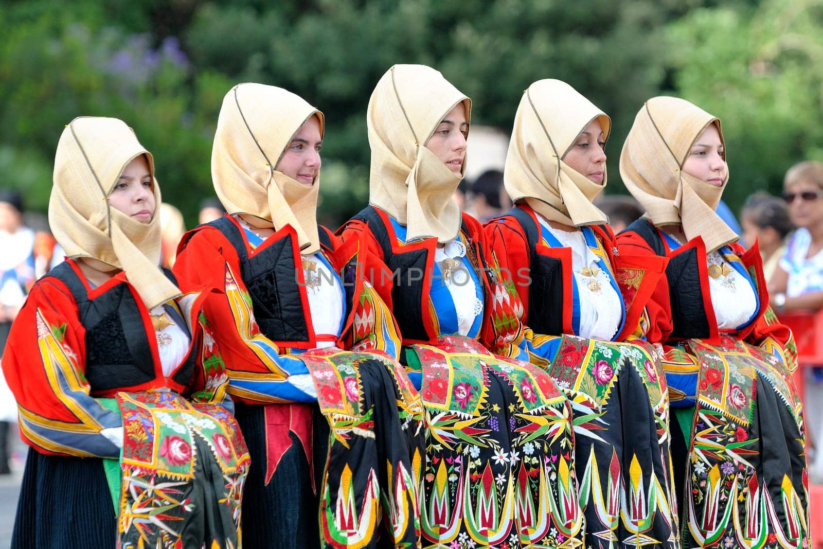 Nuoro, Sardinia, Italy - August 23, 2015: Parade of traditional costumes of Sardinia on the occasion of the Feast of the Redeemer of the Aug. 23, 2015 in Nuoro, Sardinia.