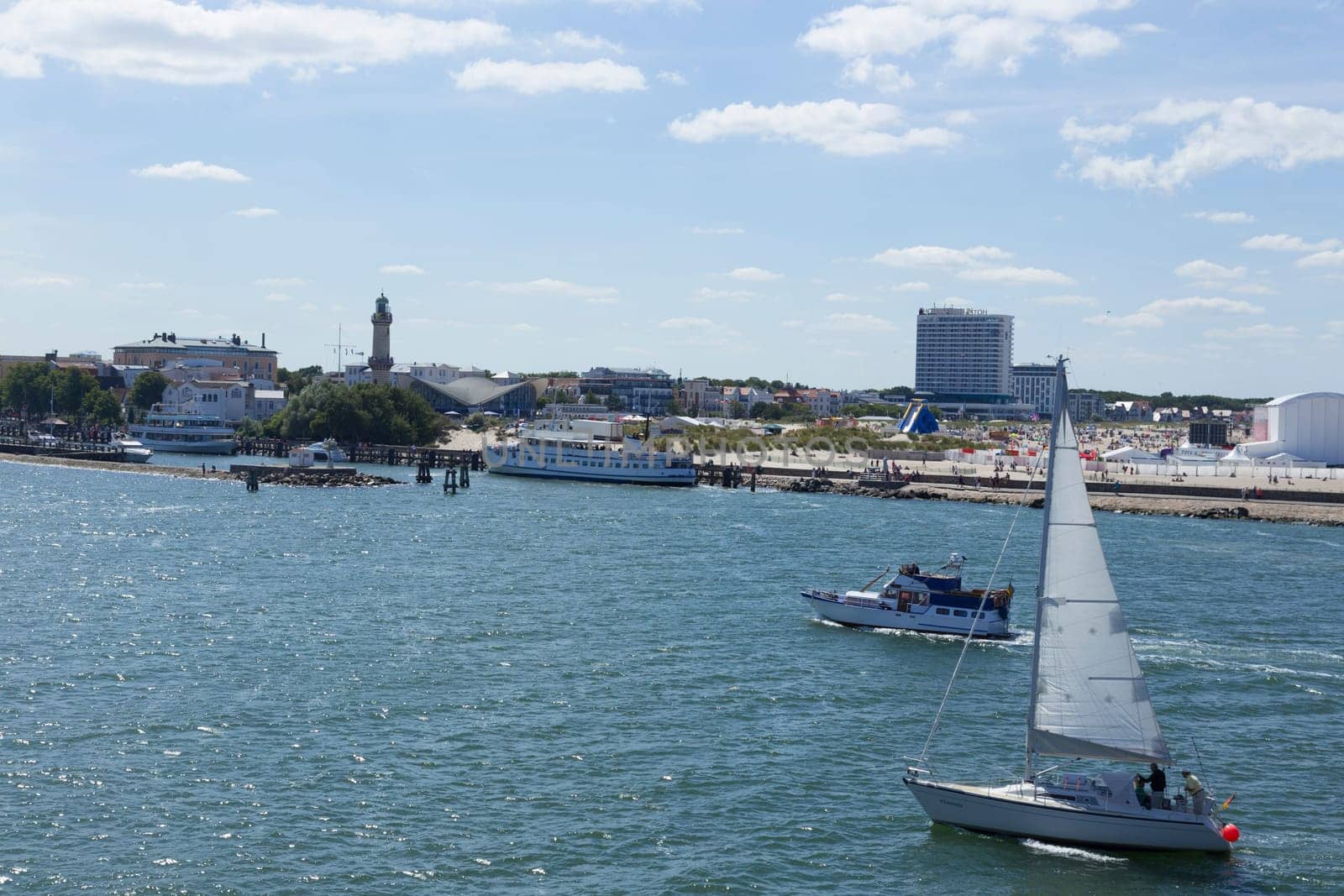 Sailboats,cash registers and ferries in the ferry port of Warnemünde