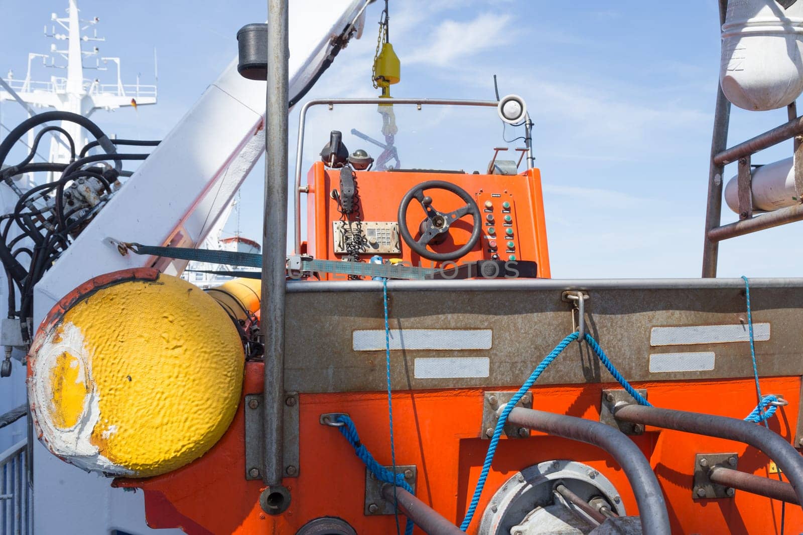 Steering position of a lifeboat on the deck of a large car ferry