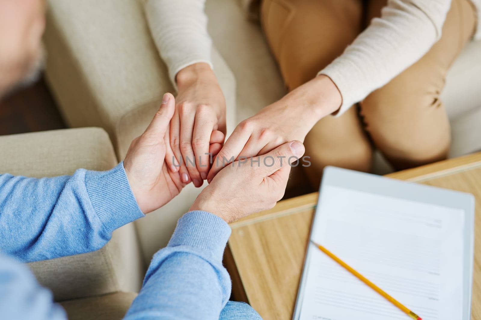 Close-up of female hands in those of man