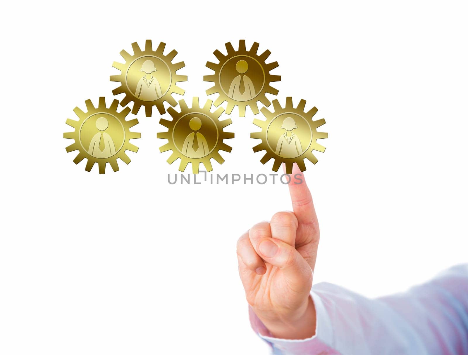 Hand is touching a golden gear train consisting of five interlocking cogs embossed with white collar worker icons. Cutout isolated over white background. Business concept for smooth teamwork.