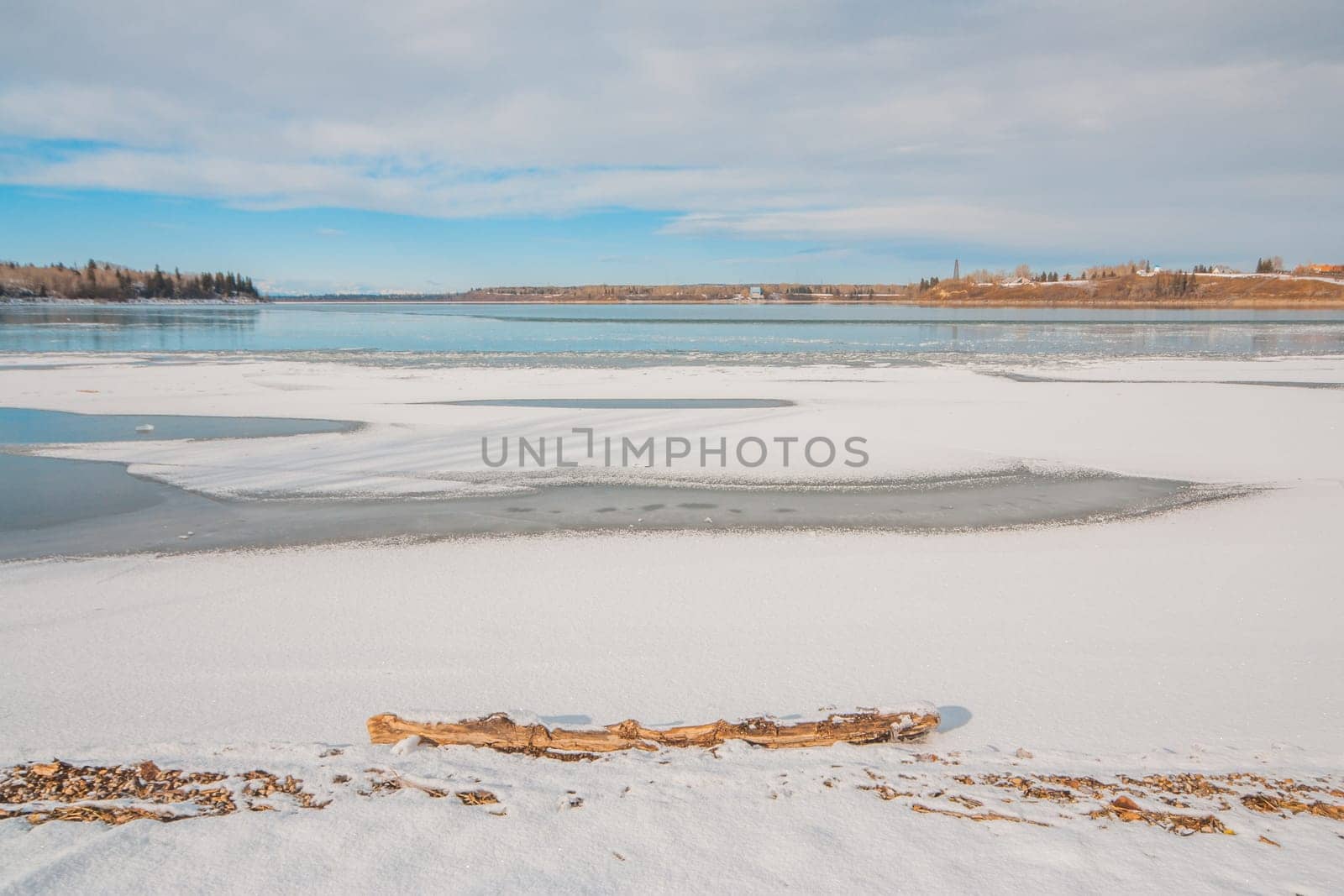 Snowy landscape of the Calgary Glenmore Reservoir in winter.