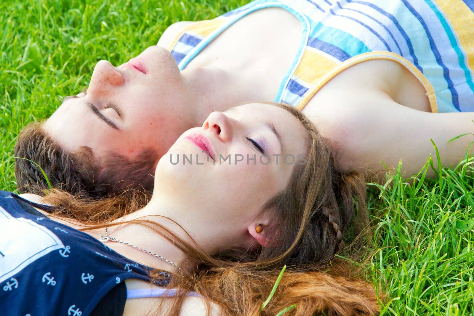 Young,happy couple in the grass