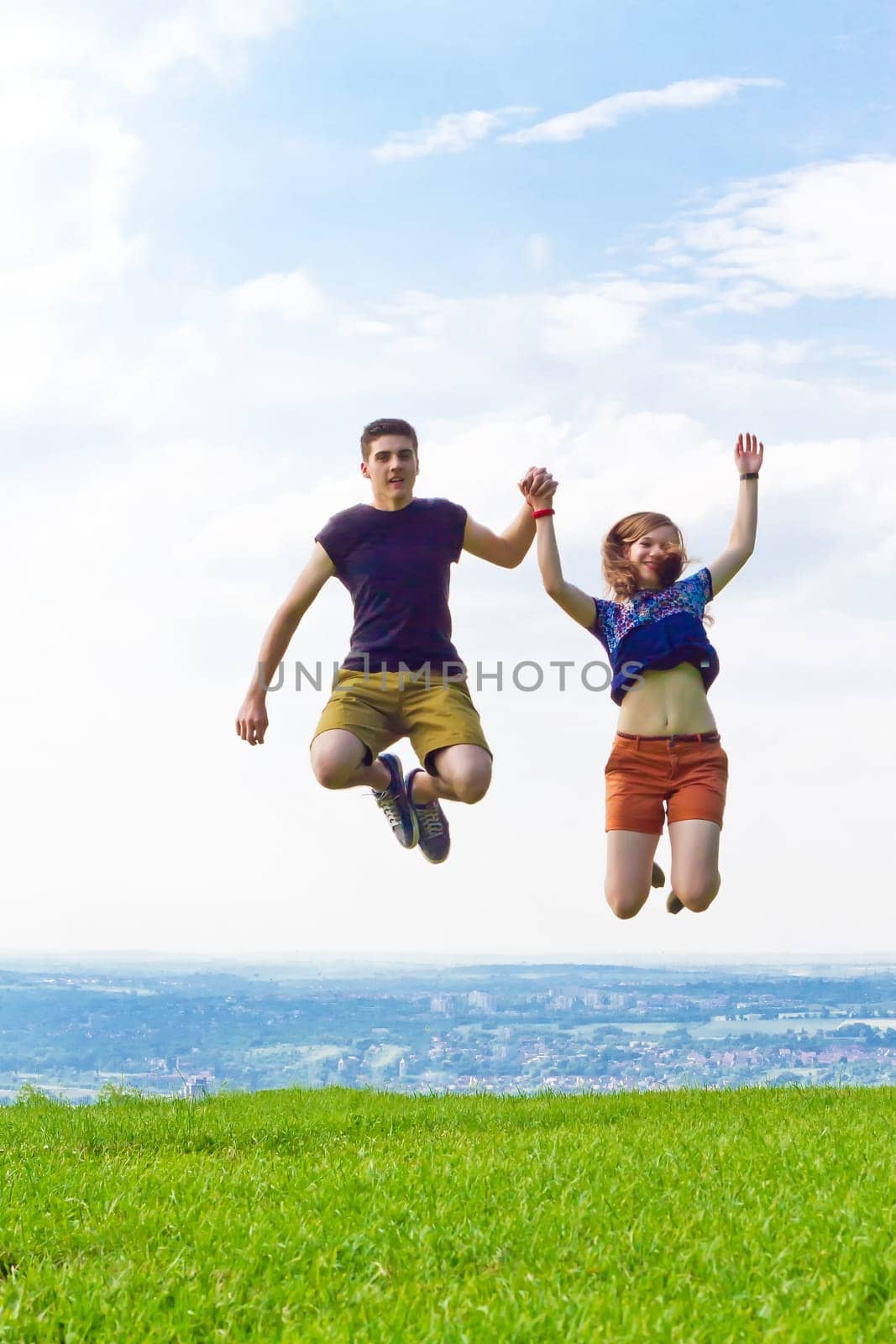 Young couple at the air jump