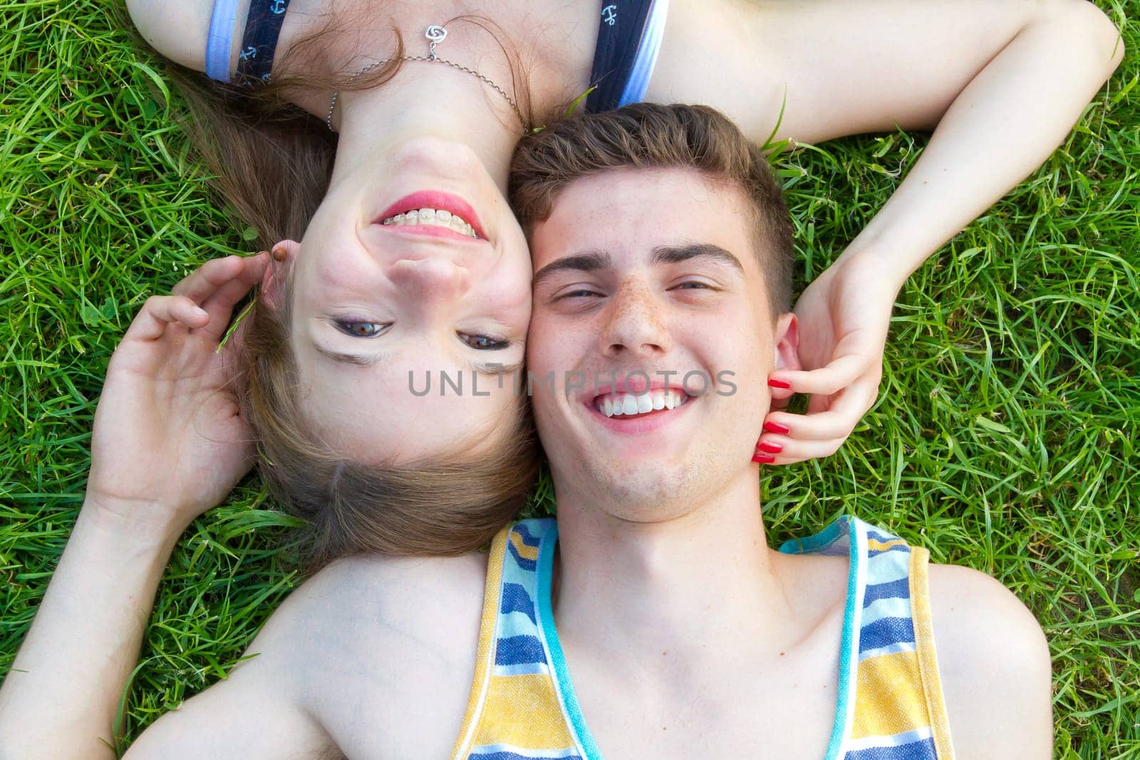 Young,happy couple in the grass