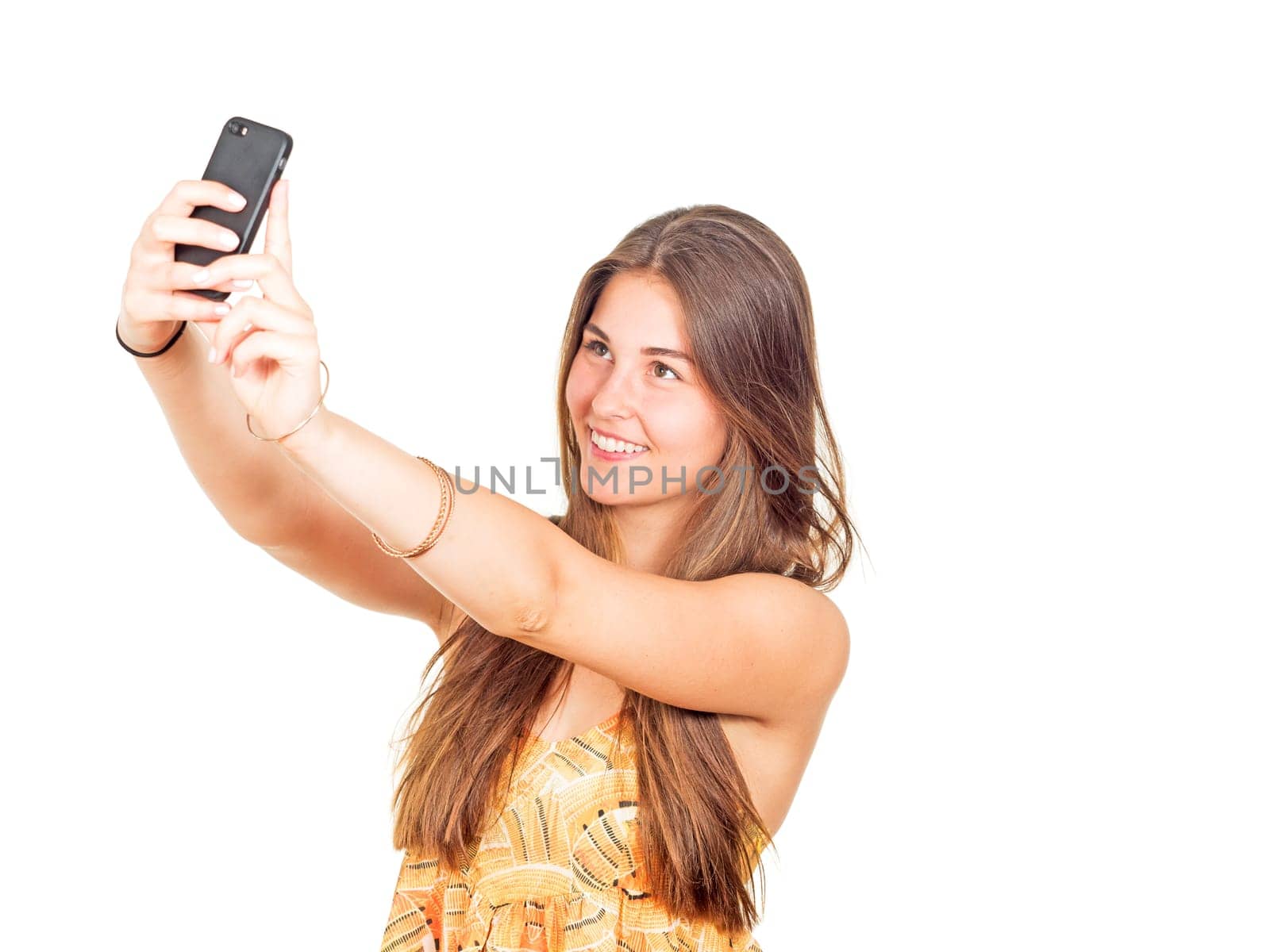 attractive young woman takes a selfie