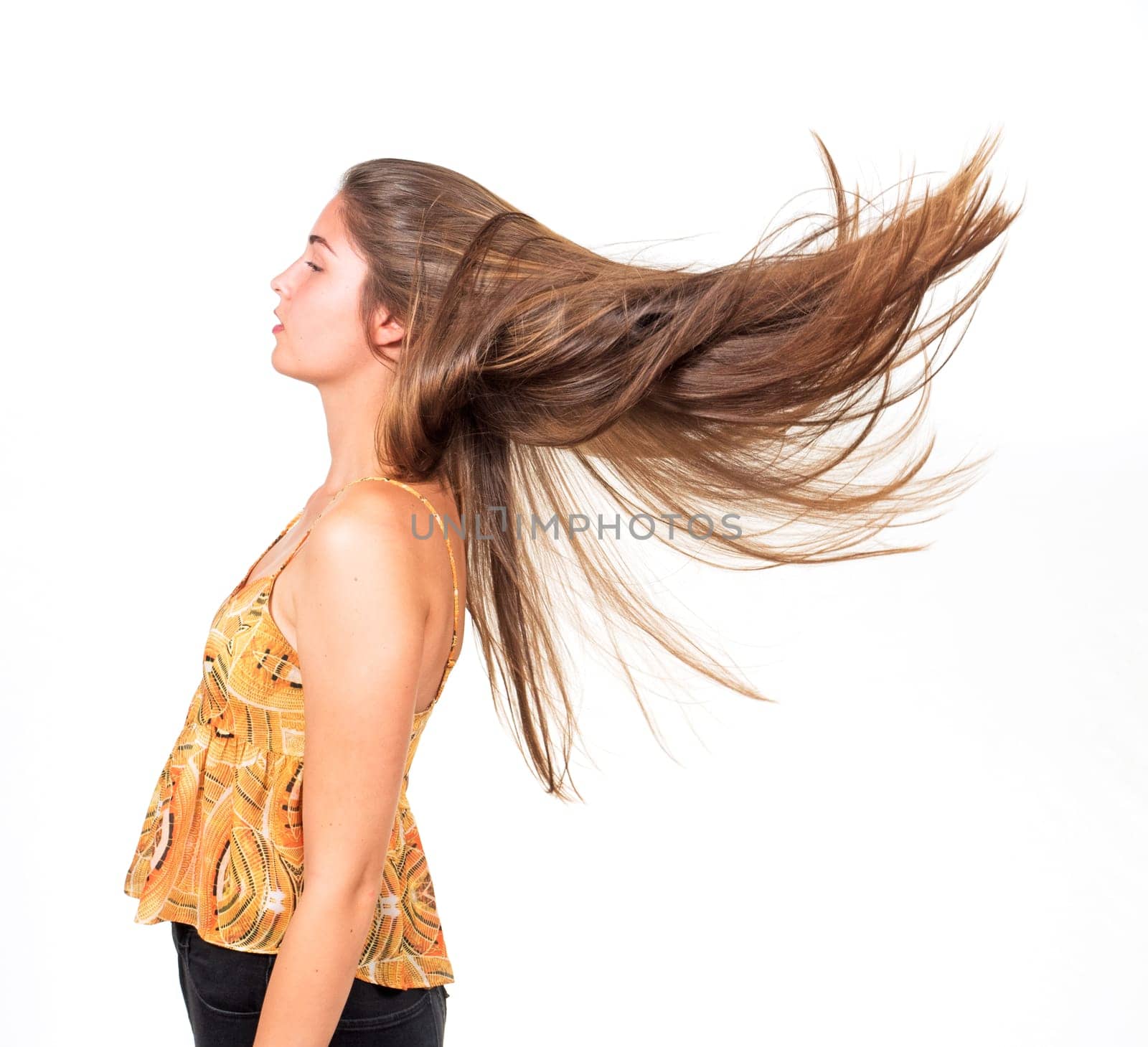 attractive young woman lets hair fly
