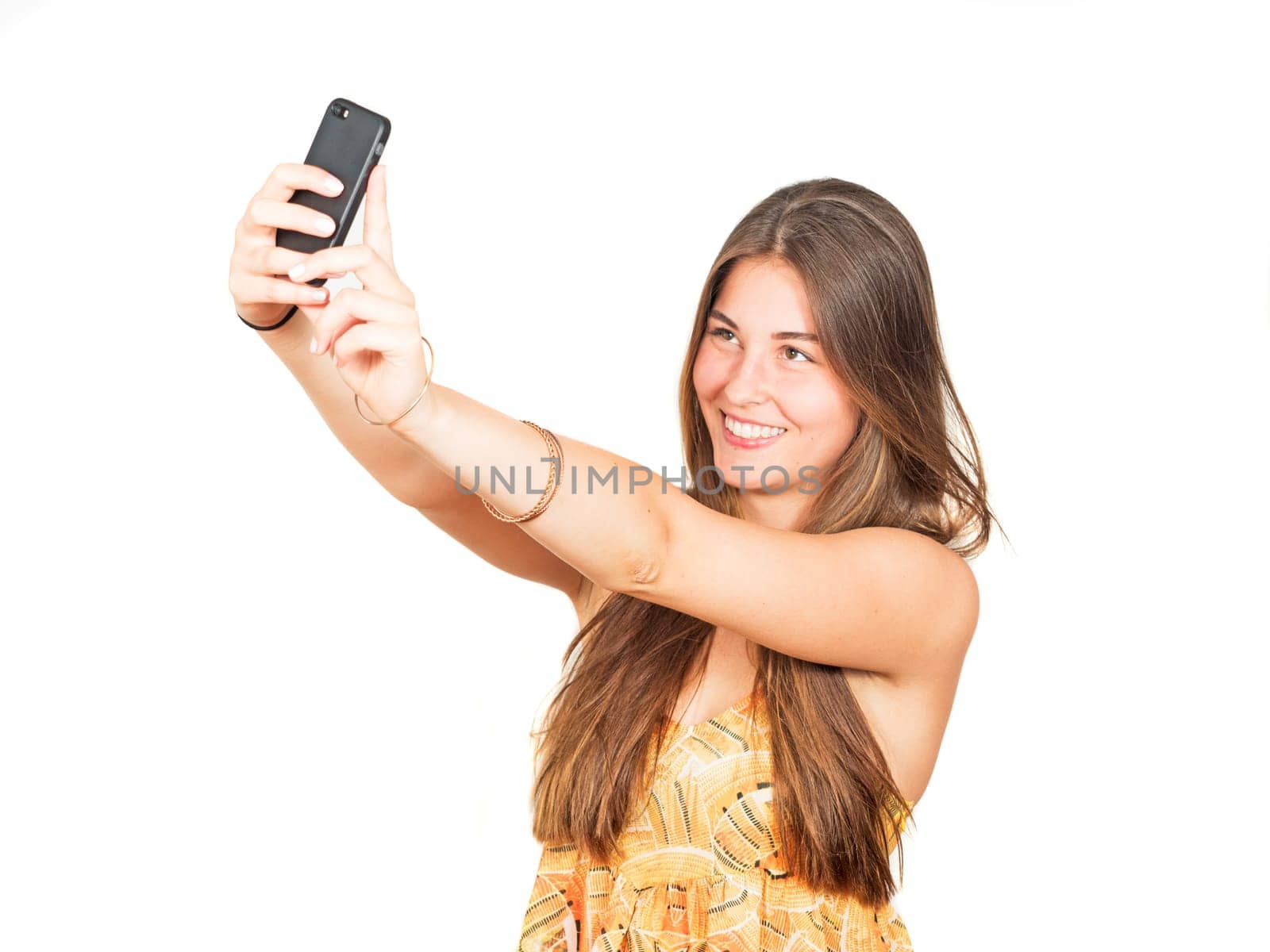 attractive young woman takes a selfie