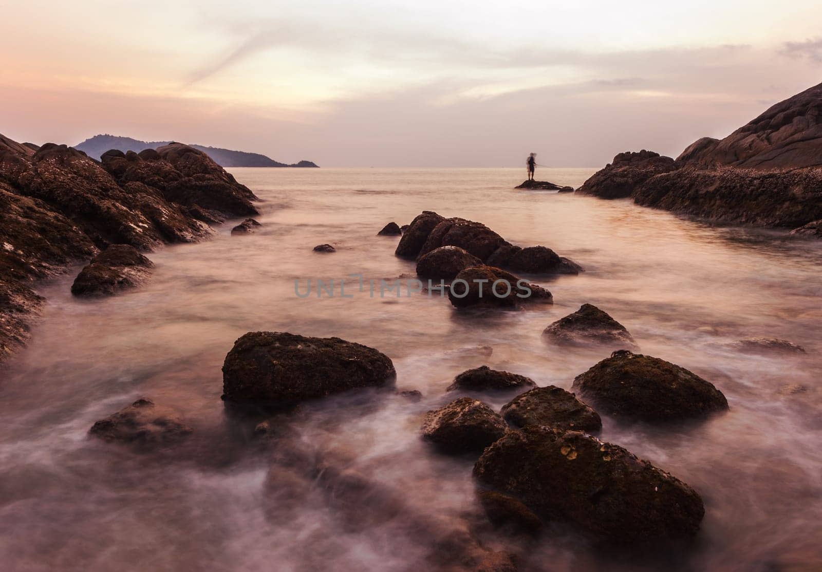 Seascape colorful with color of sunset in twilight, Long speed shutter technique