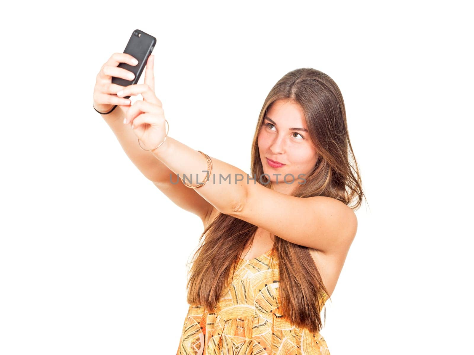attractive young woman takes a selfie