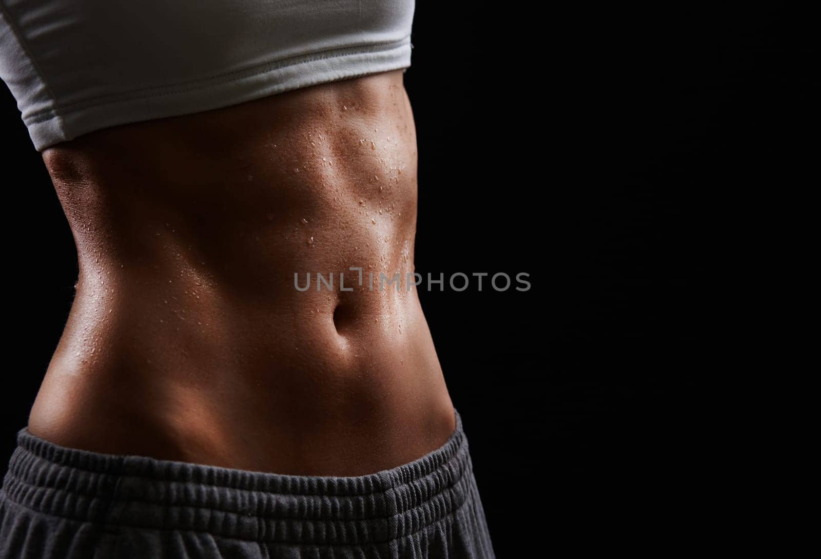 Wet torso of young woman wearing activewear