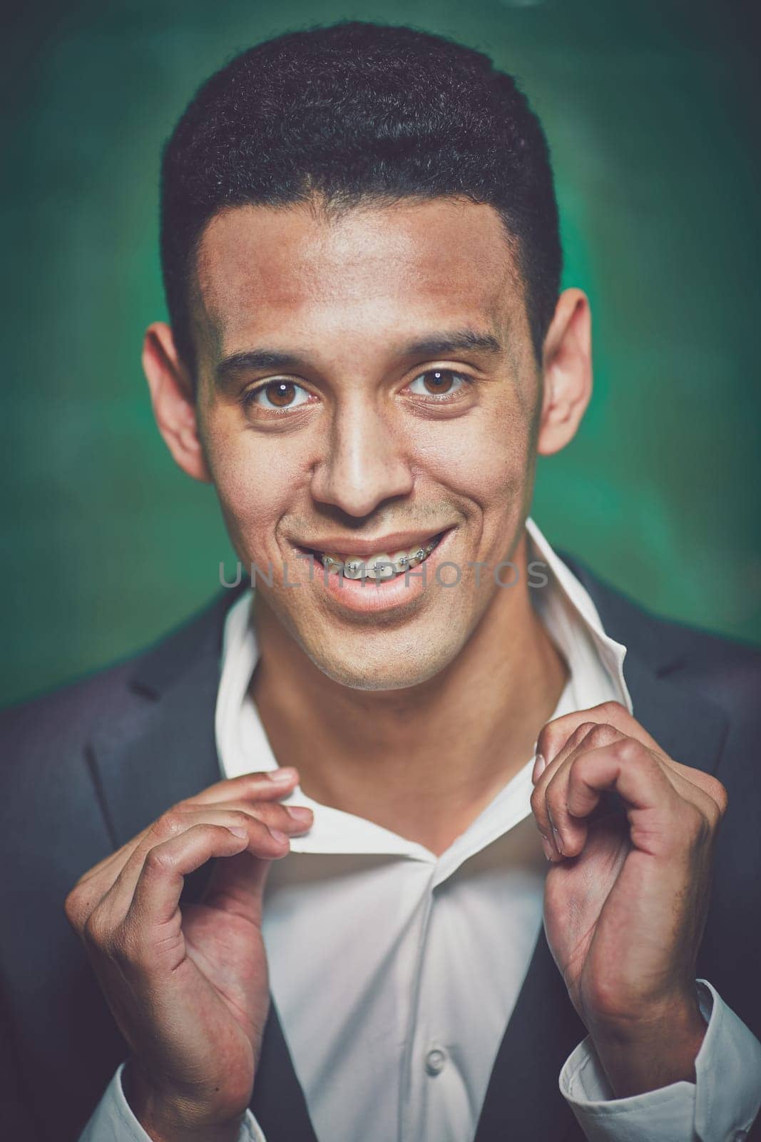 Handsome businessman in formalwear posing in front of camera