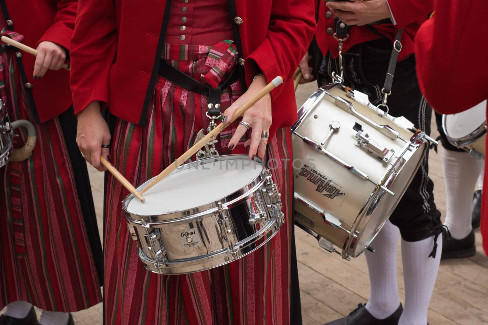 MUNICH, GERMANY – SEPT. 20, 2015: Traditional Marching Bands with Local Costumes entertain Crowds of visitors at the annual Oktoberfest. The Festival runs from September 19th until October 4th 2015 in Munich, Germany