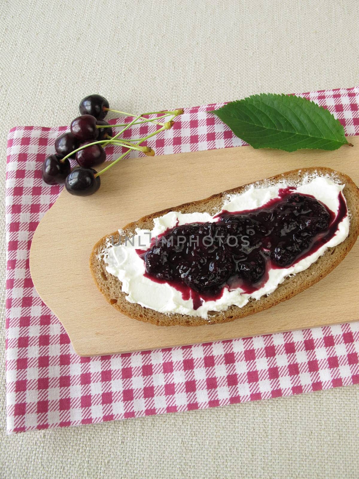 Bread with cherry jam