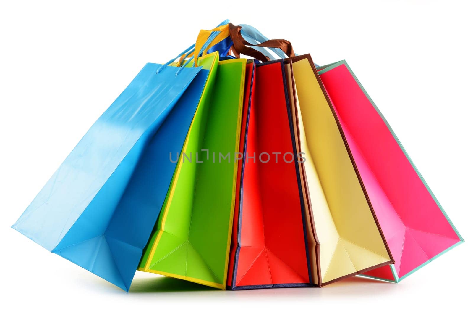 Colorful paper shopping bags isolated on white background