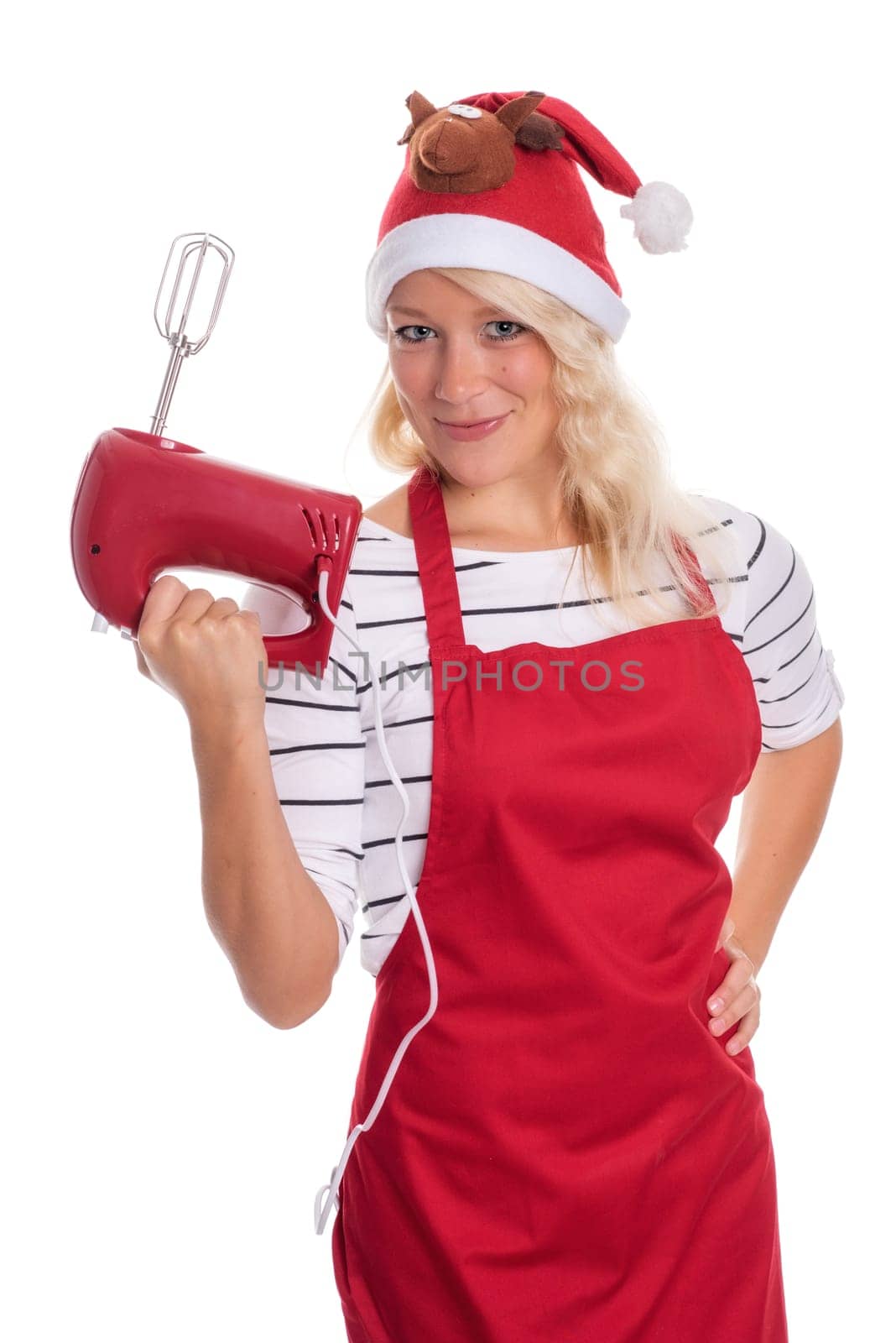 Christmas woman in apron holds a blender