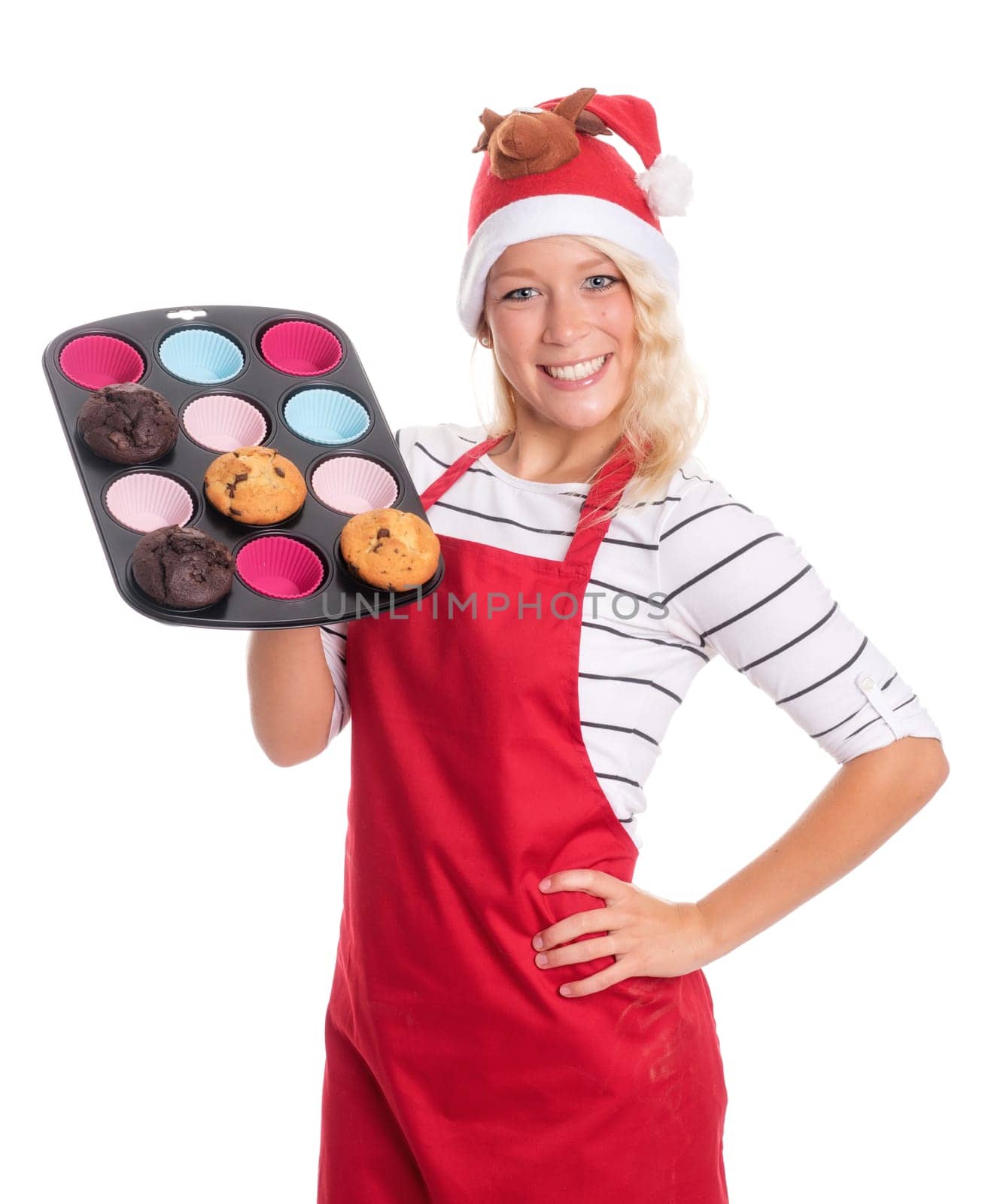 Woman with Christmas hat offers homemade muffins