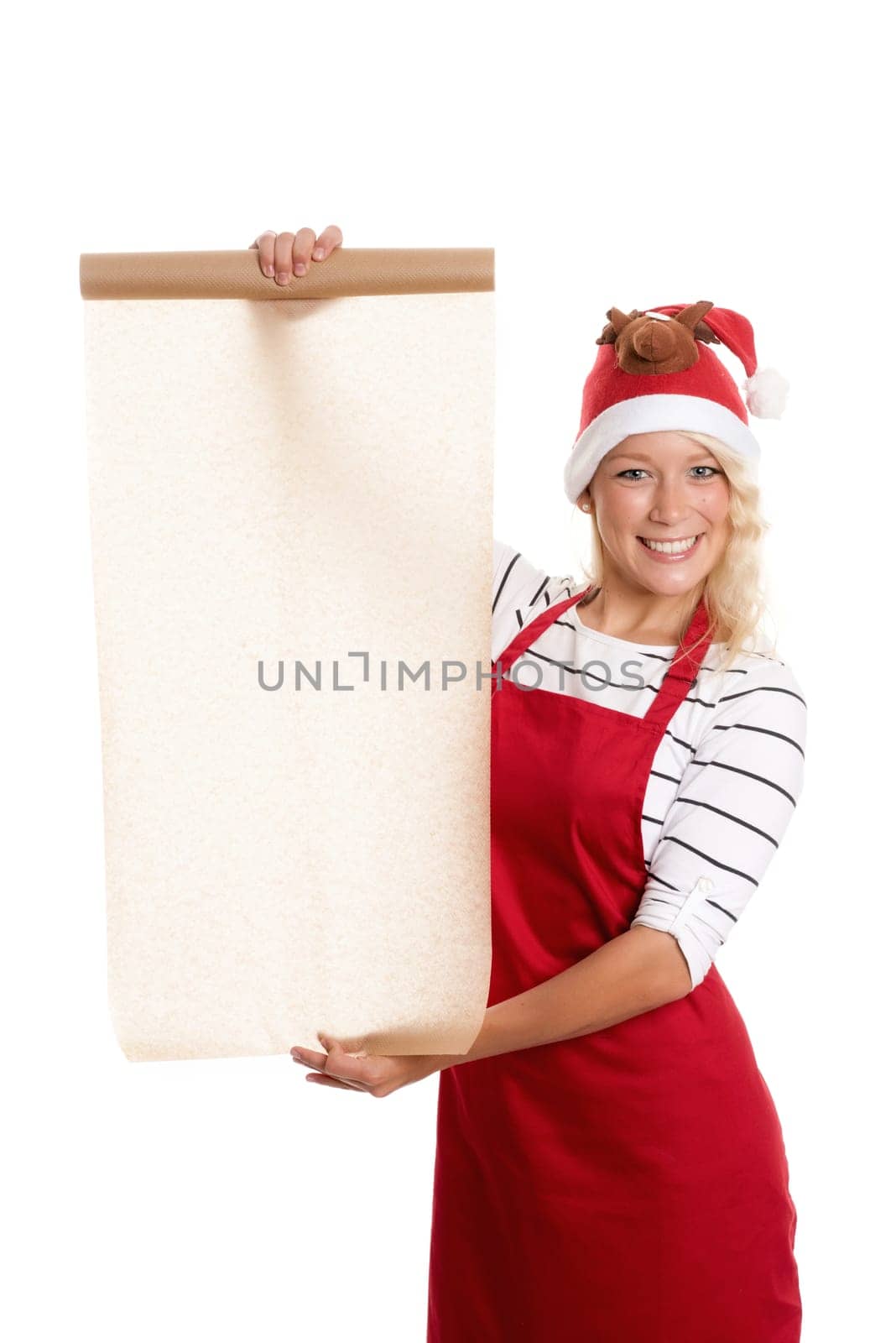 Christmas woman holds a roll of baking paper as advertising space