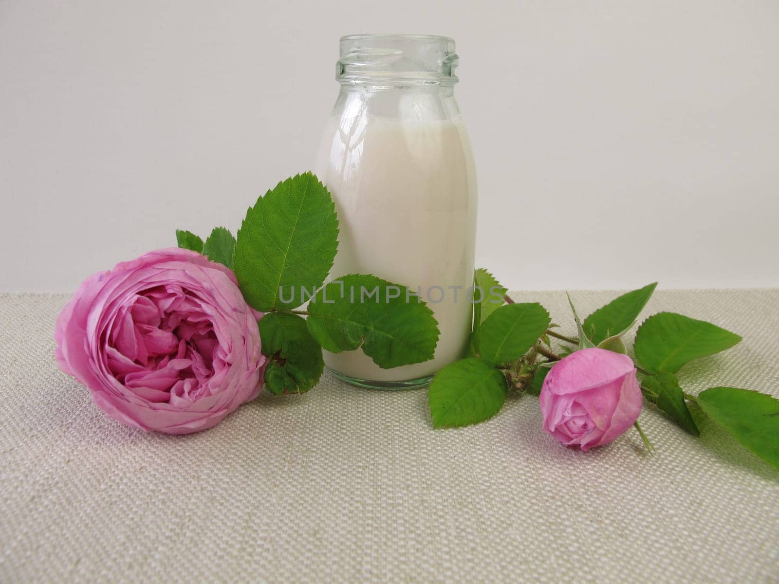 Roses yoghurt drink and rose petals