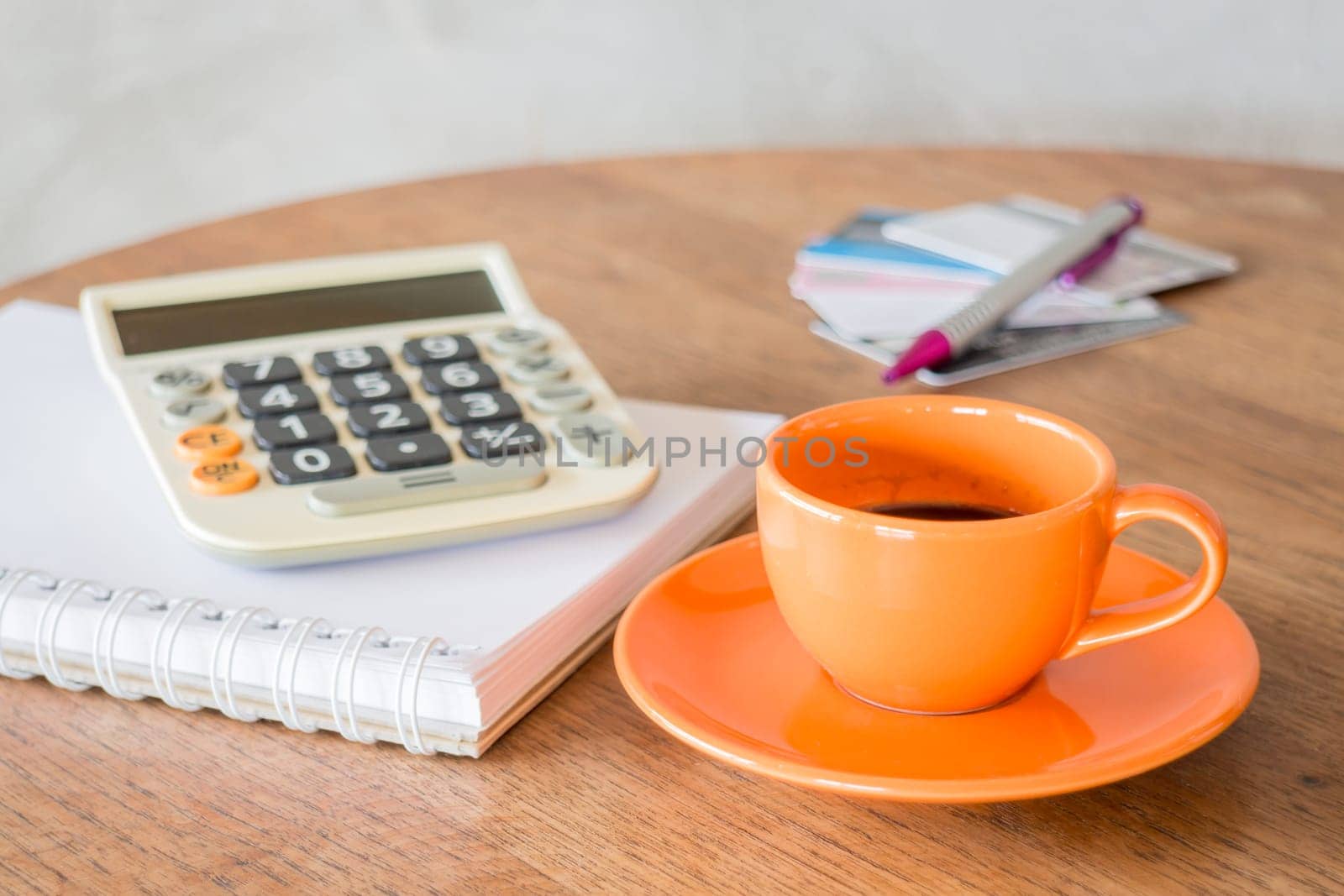 Hot coffee cup on wooden table, stock photo