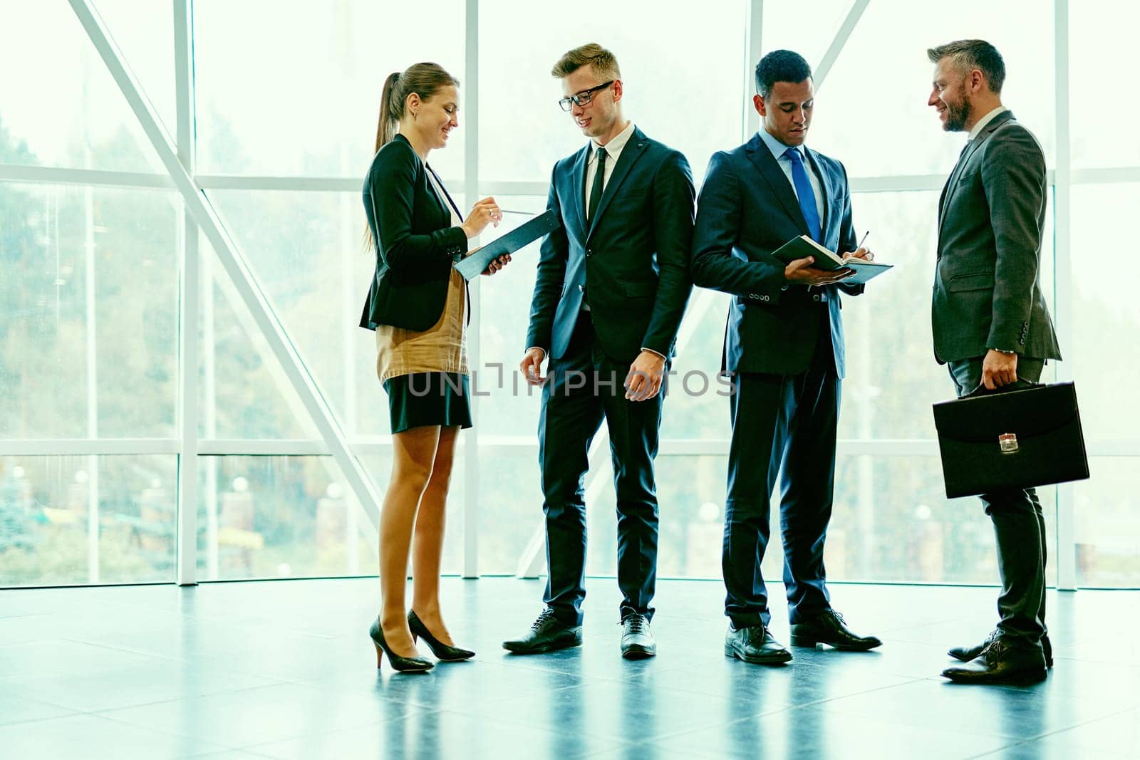 Business people asking and answering questions