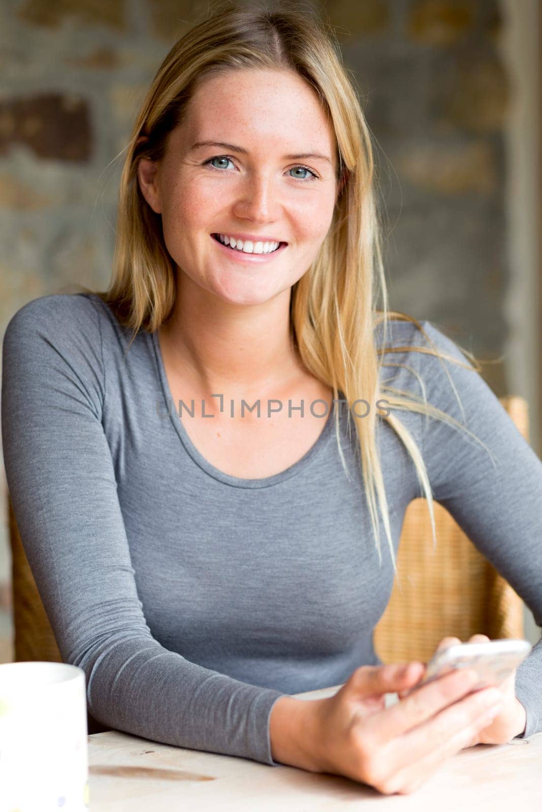Portrait of a woman with a smartphone