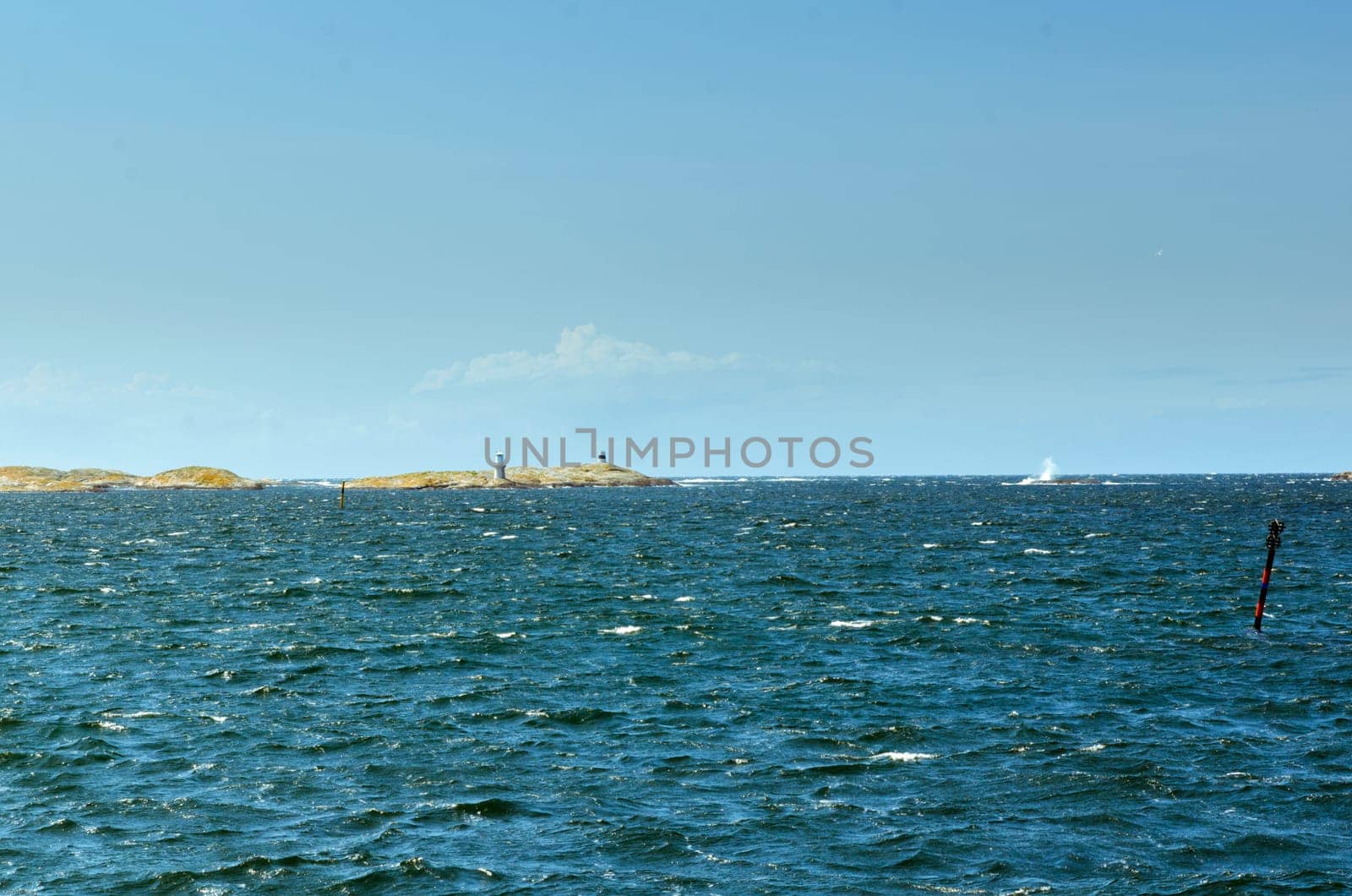 Blowing on the swedish west coast on a blue sky