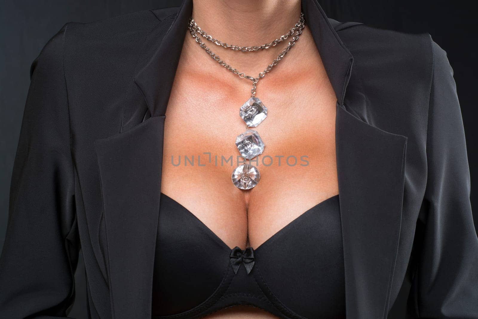 Big Breasts Lady In Sexy Corset and necklace jewelry