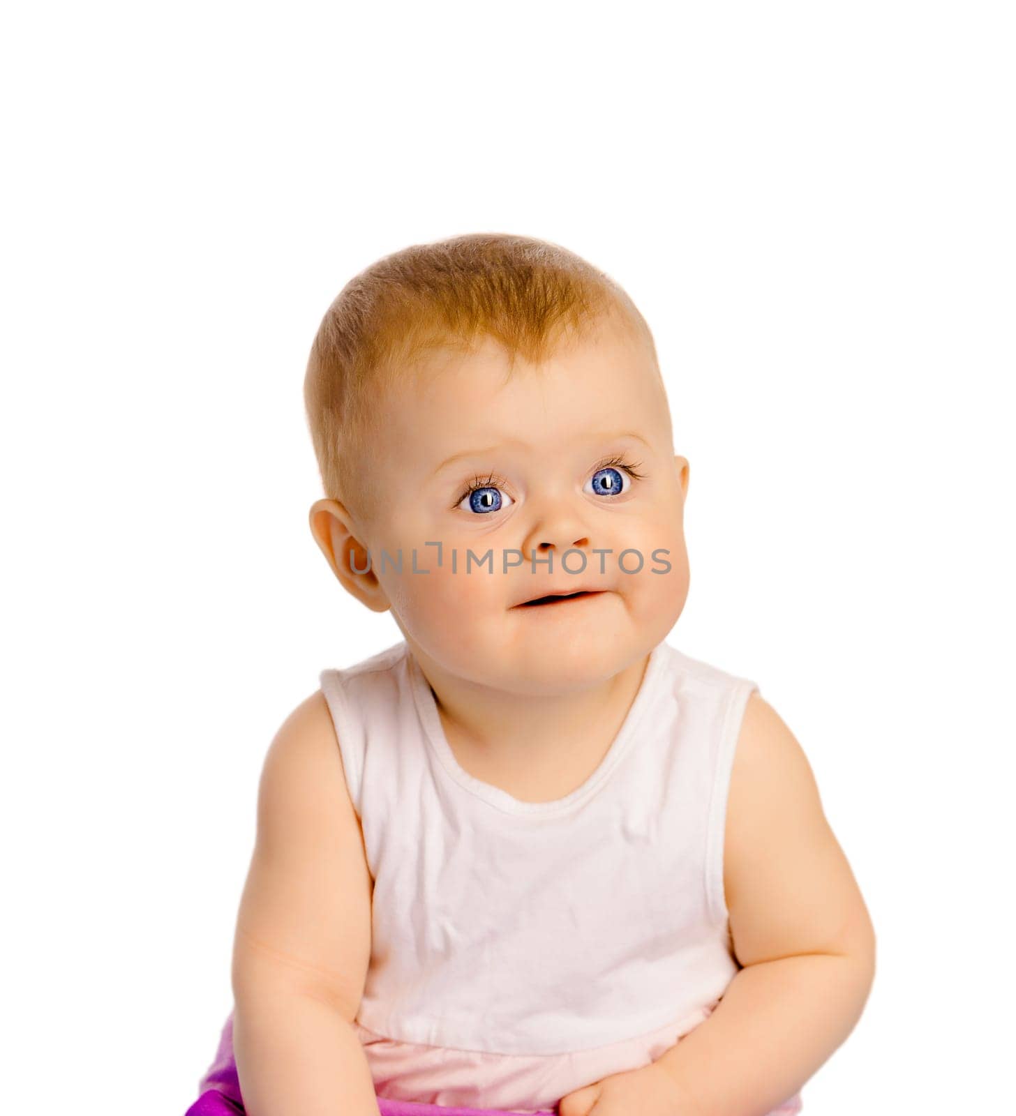 Portrait of adorable baby girl. Studio. Isolated