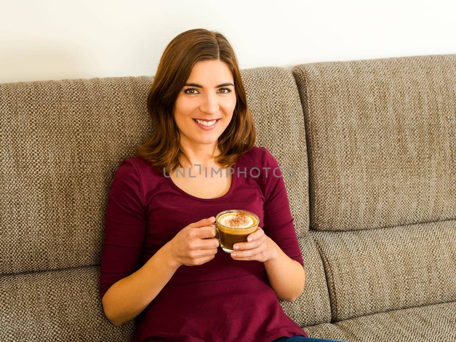 Beautiful woman at home Having a good time with cup a coffee