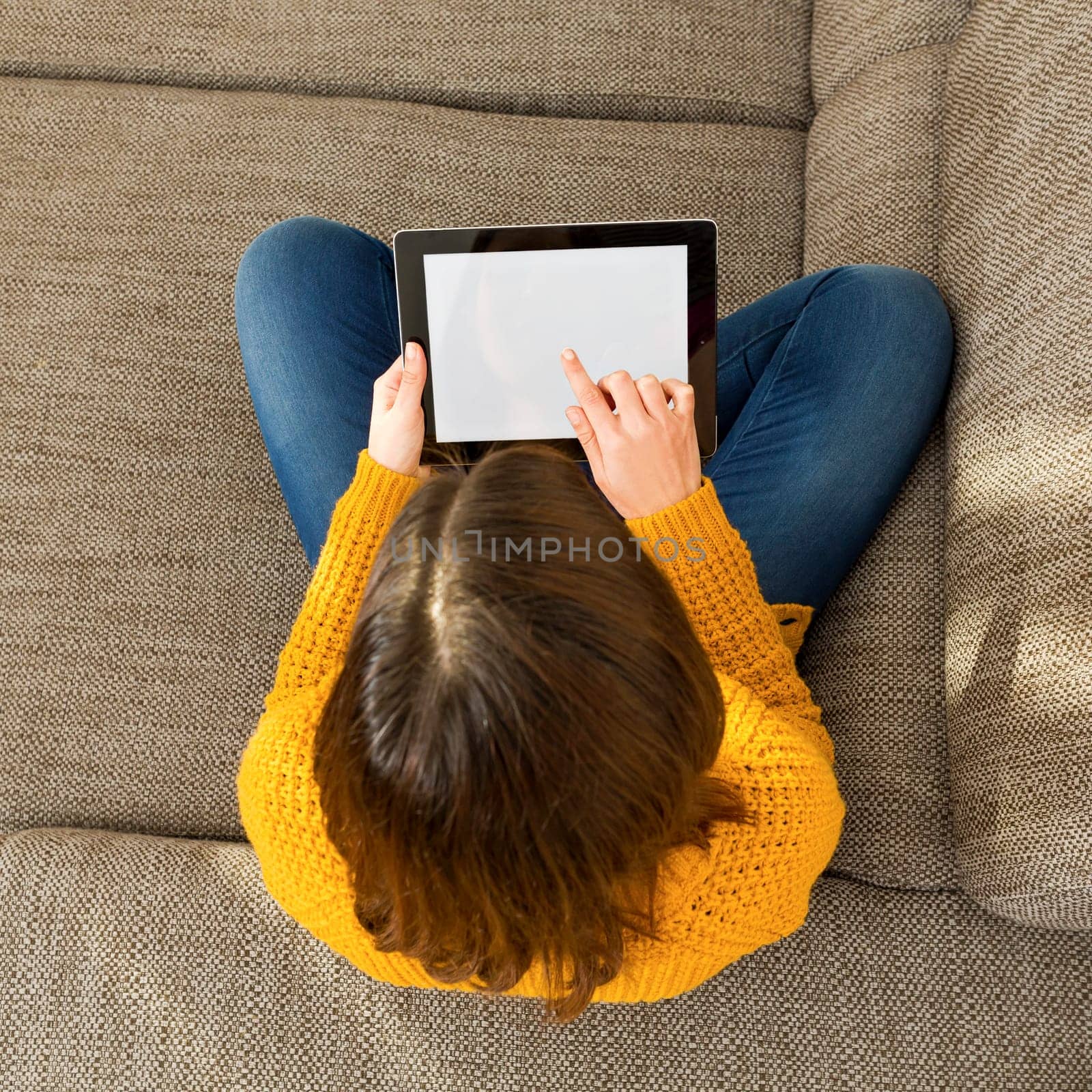 Shot of a gorgeous young woman using a digital tablet indoors, with copy space
