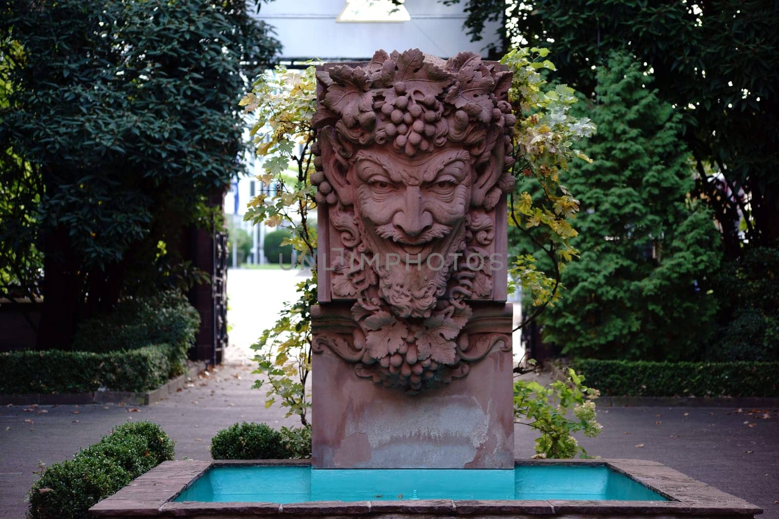 Mainz,Germany – September 19,2015: A fountain with a Bacchus sculpture in the courtyard of the Kupferberg Terrassen on September 19,2015 in Mainz.