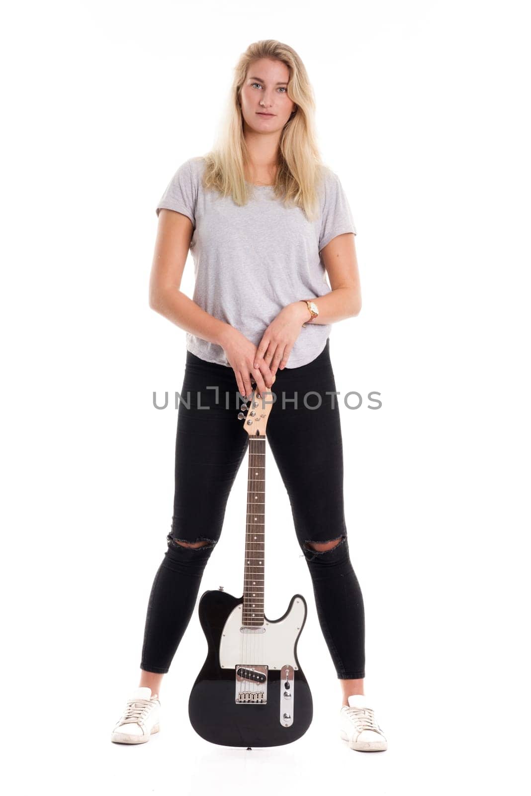 Blonde girl with electric guitar