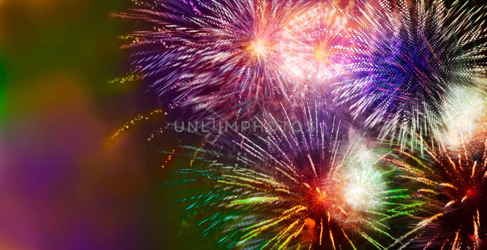 nightly fireworks with colorful light and glitter patterns,graphic star shapes with motion blur added