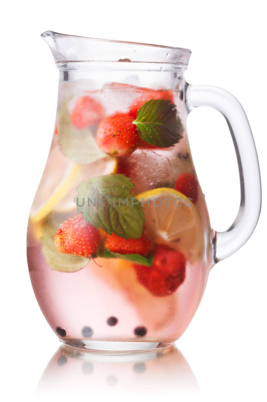 Glass pitcher of strawberry mojito