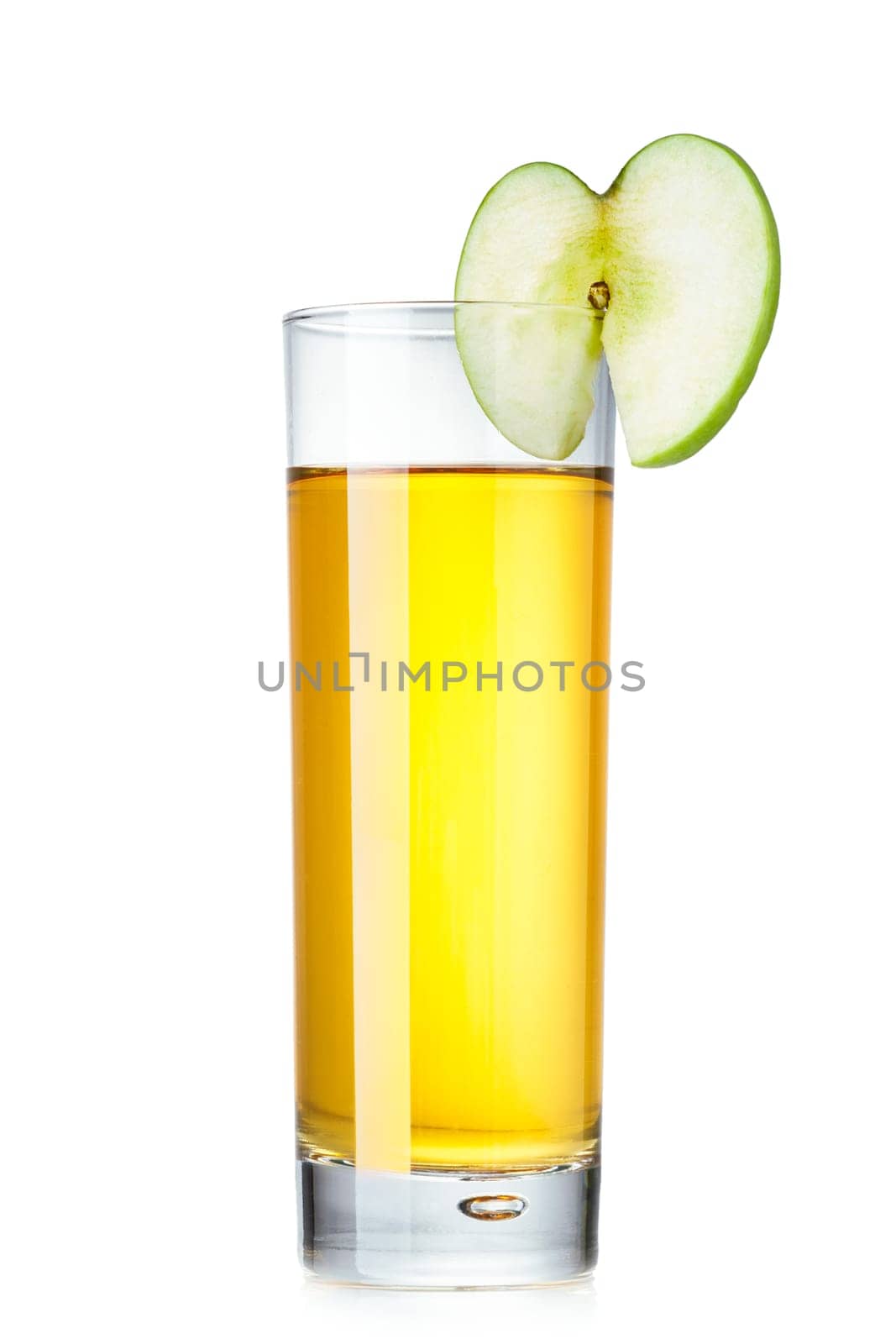 Fresh apple juice in highball glass decorated with green apple slice