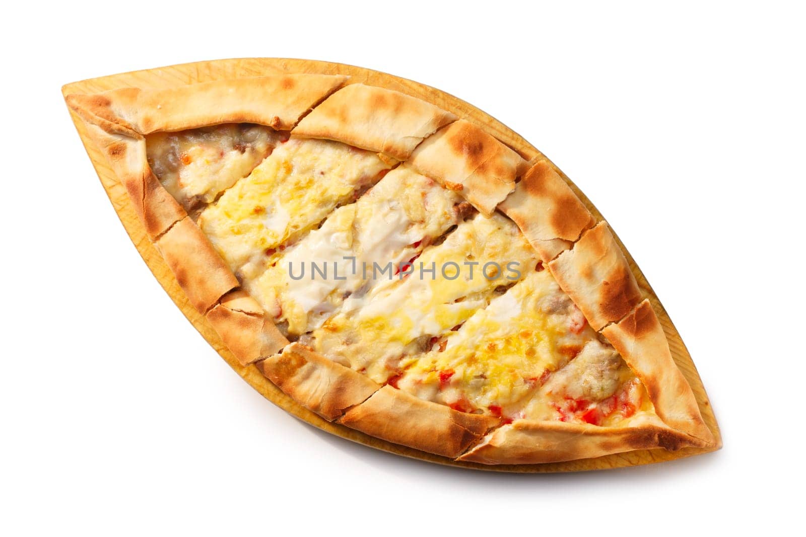 Sliced Turkish Pide on a wooden plate. Traditional Turkish pizza. Healthy dinner