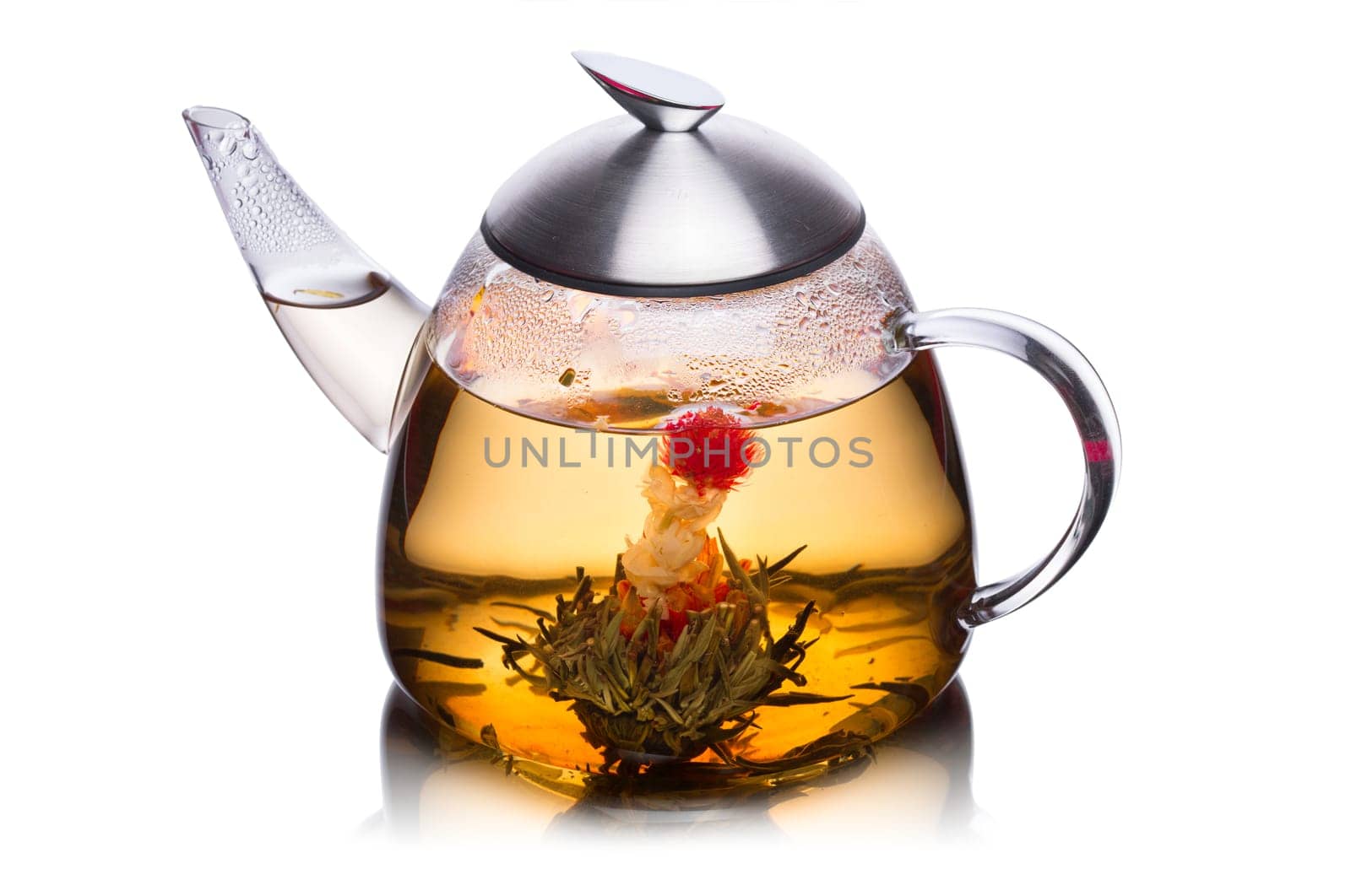 Teacup full of herbal tea with blossoming flower. Healthy eating. Sun tea
