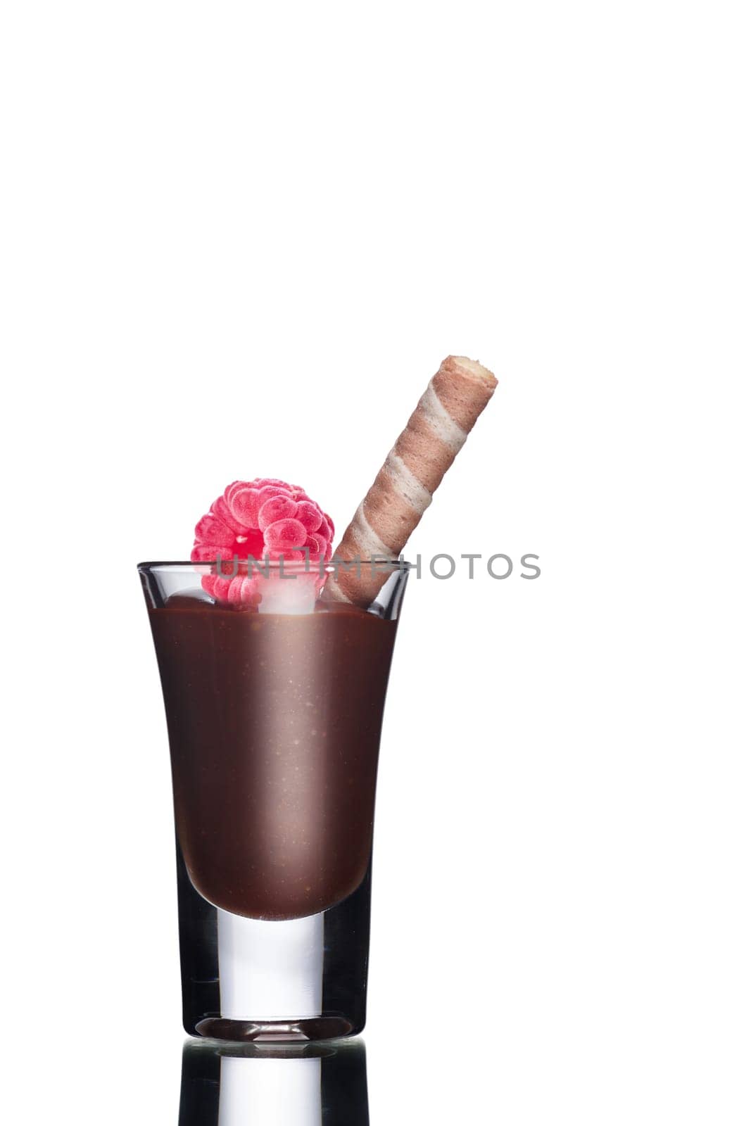 Dessert with chocolate decorated with raspberries and mint leaves. Sweet food. Parfait