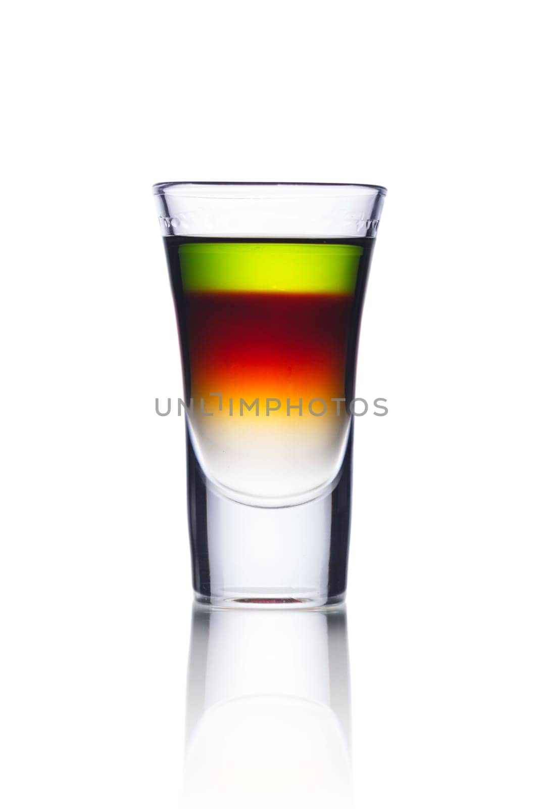 Colorful alcoholic cocktail in a shot glass