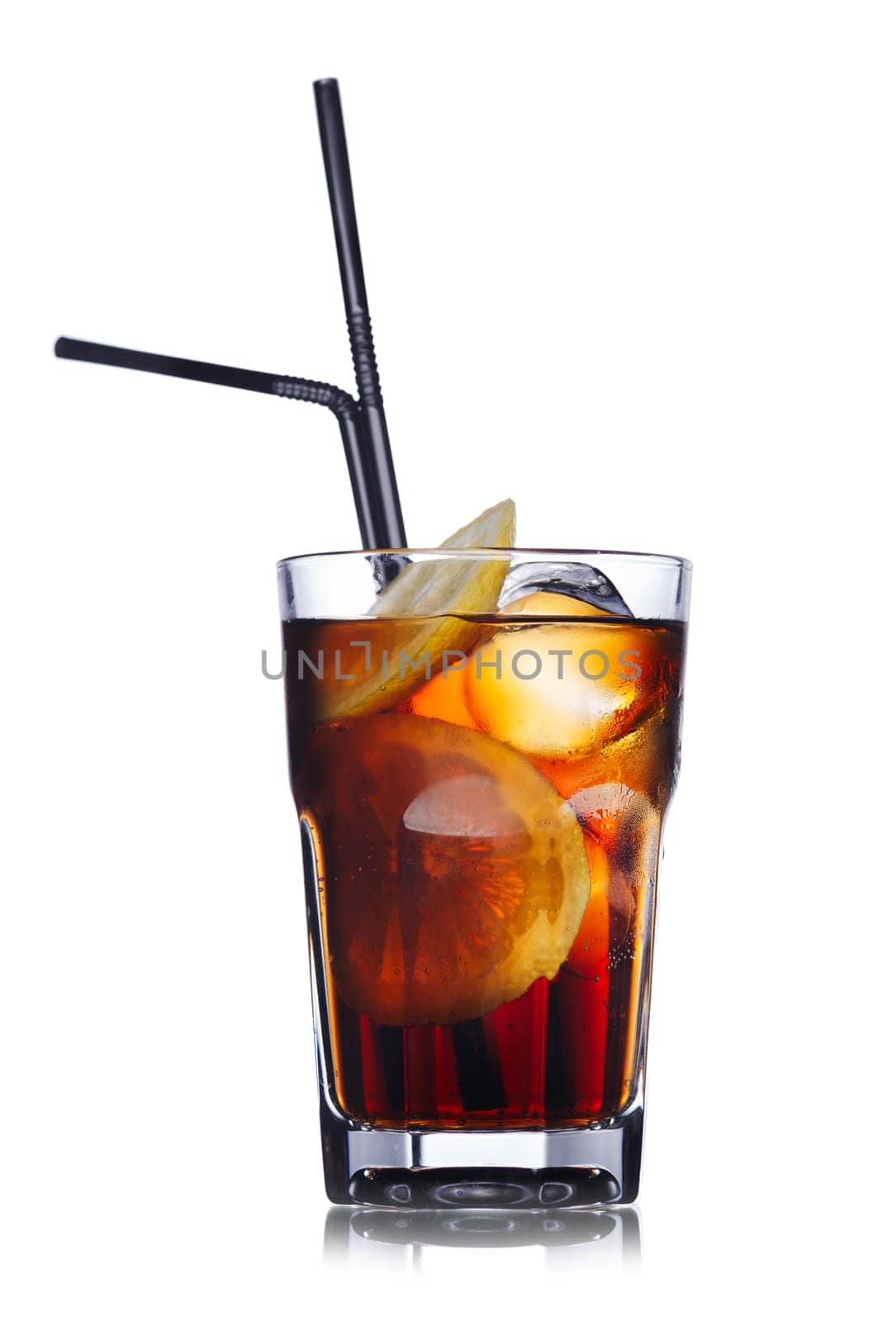 Brandy with cola cocktail. Summer refreshing cocktail with straws