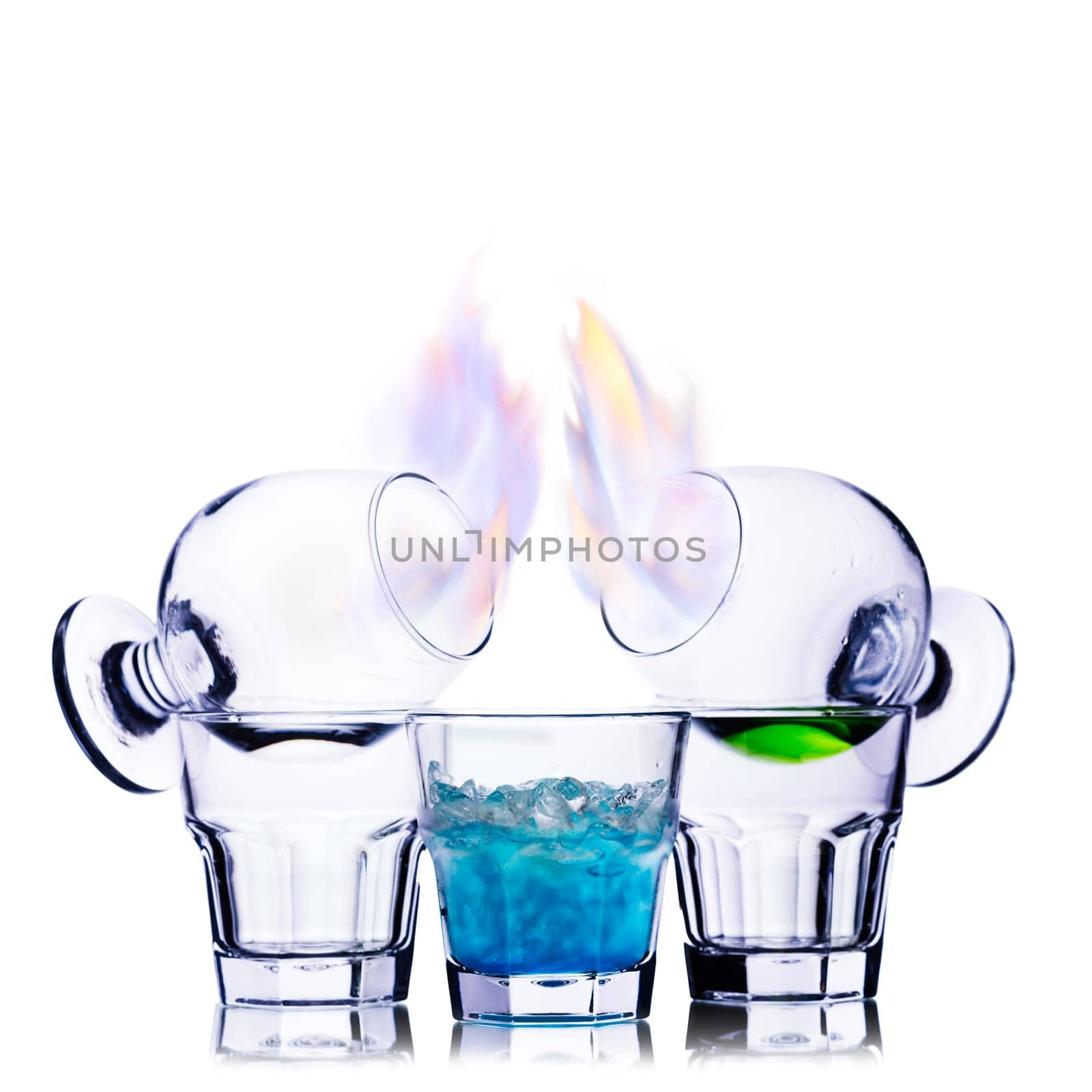 Burning alcoholic cocktail isolated on white